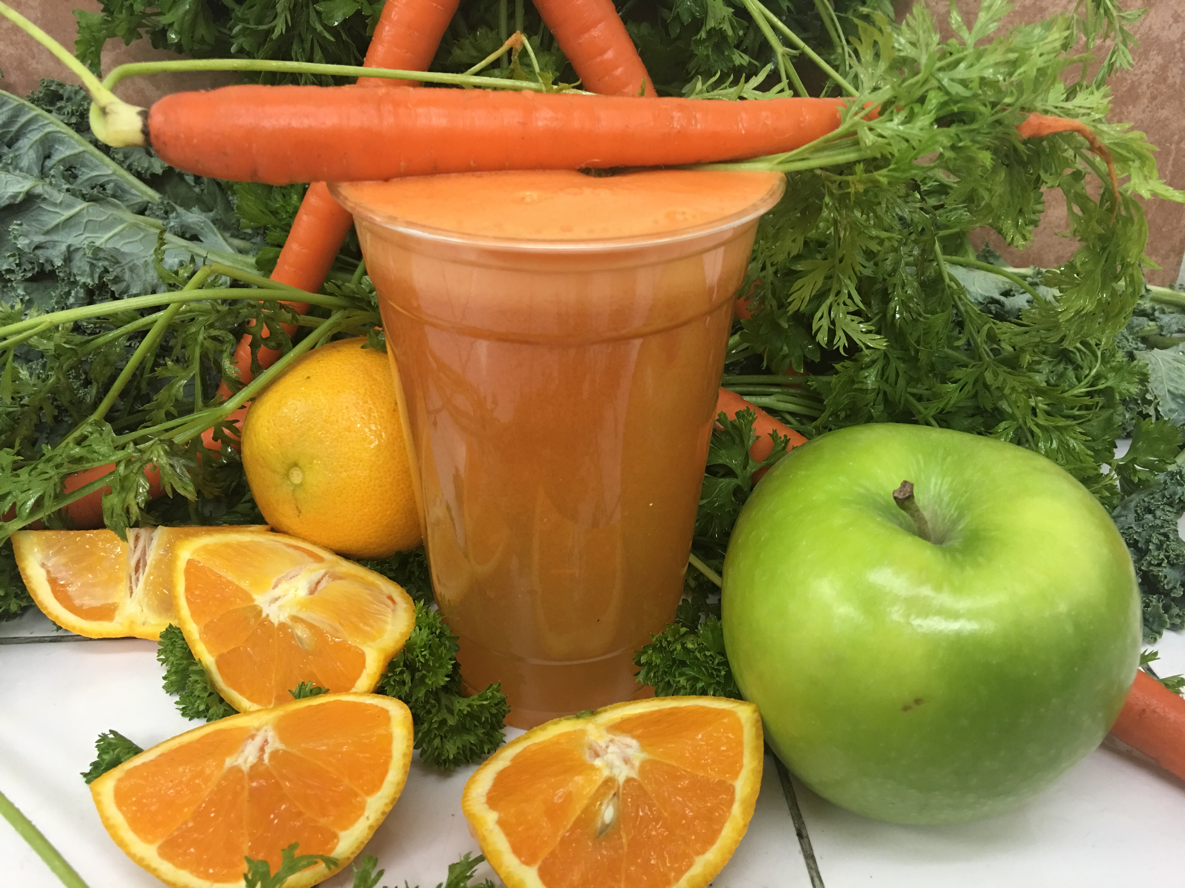 Order 2. Carrot, Orange and Apple Juice food online from Elmhurst Deli store, Elmhurst on bringmethat.com