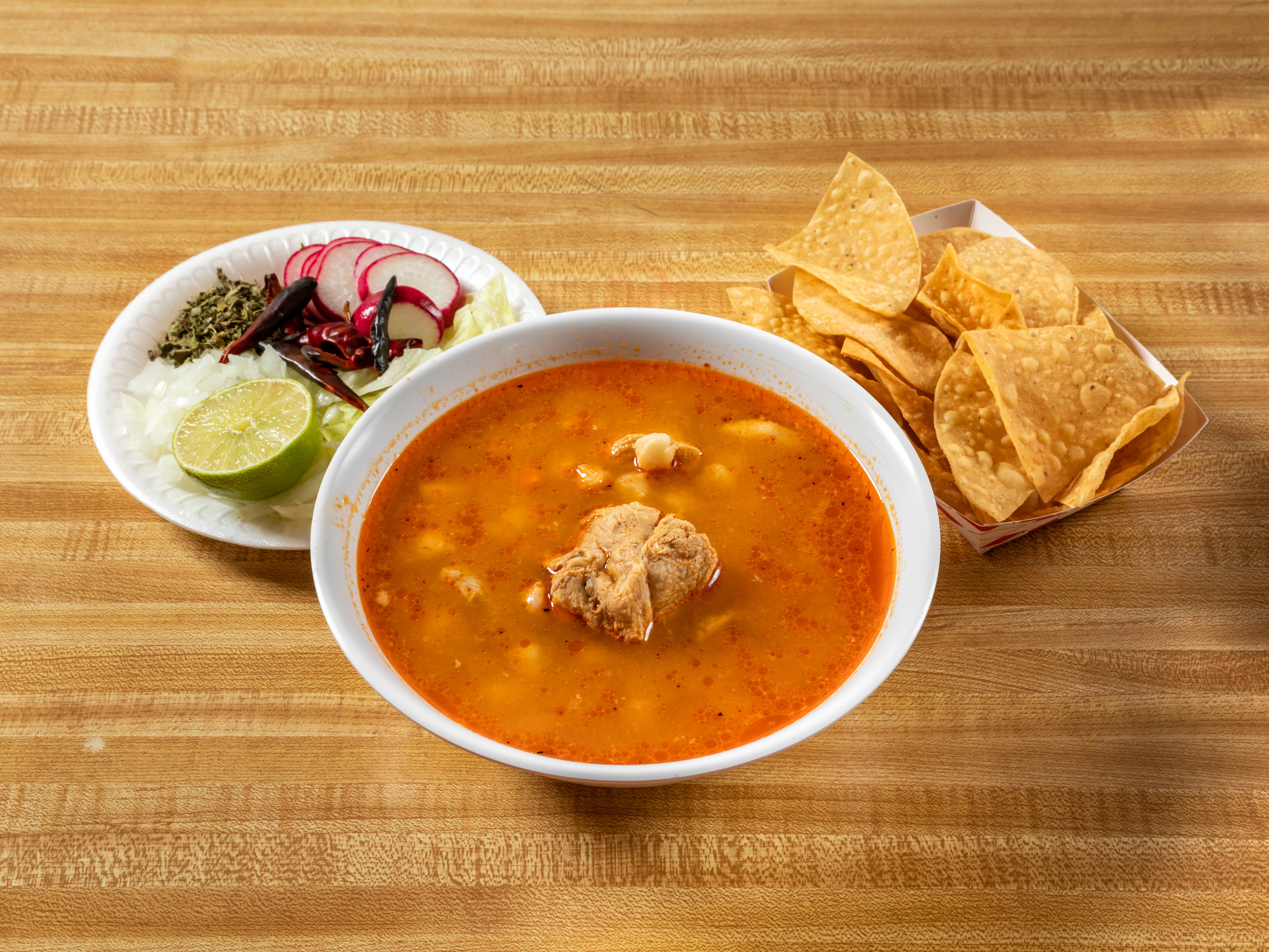 Order Pozole food online from Don Jacinto Pollo Grill store, Santa Ana on bringmethat.com