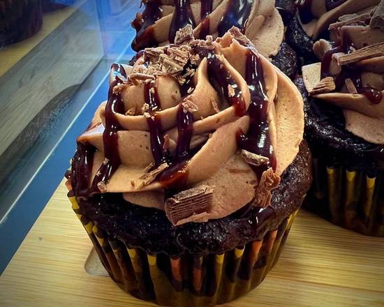Order Triple Chocolate Fudge Cupcake (1 pc) food online from Pink Daisy Cakes store, Grand Rapids on bringmethat.com