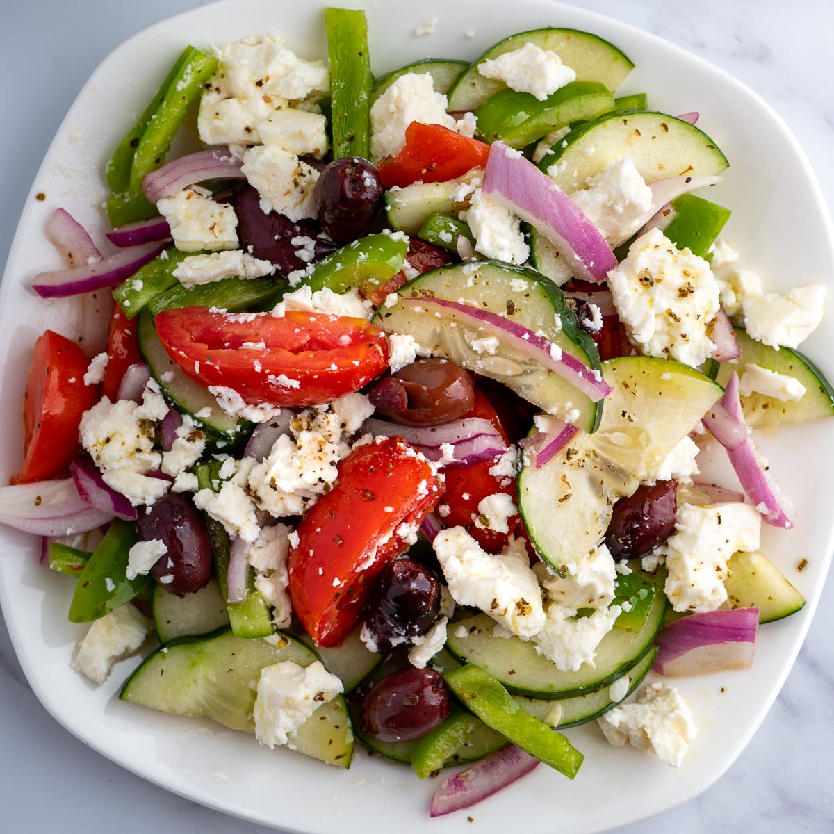Order Greek Salad - Small food online from Wild Tiger Pizza store, Seattle on bringmethat.com