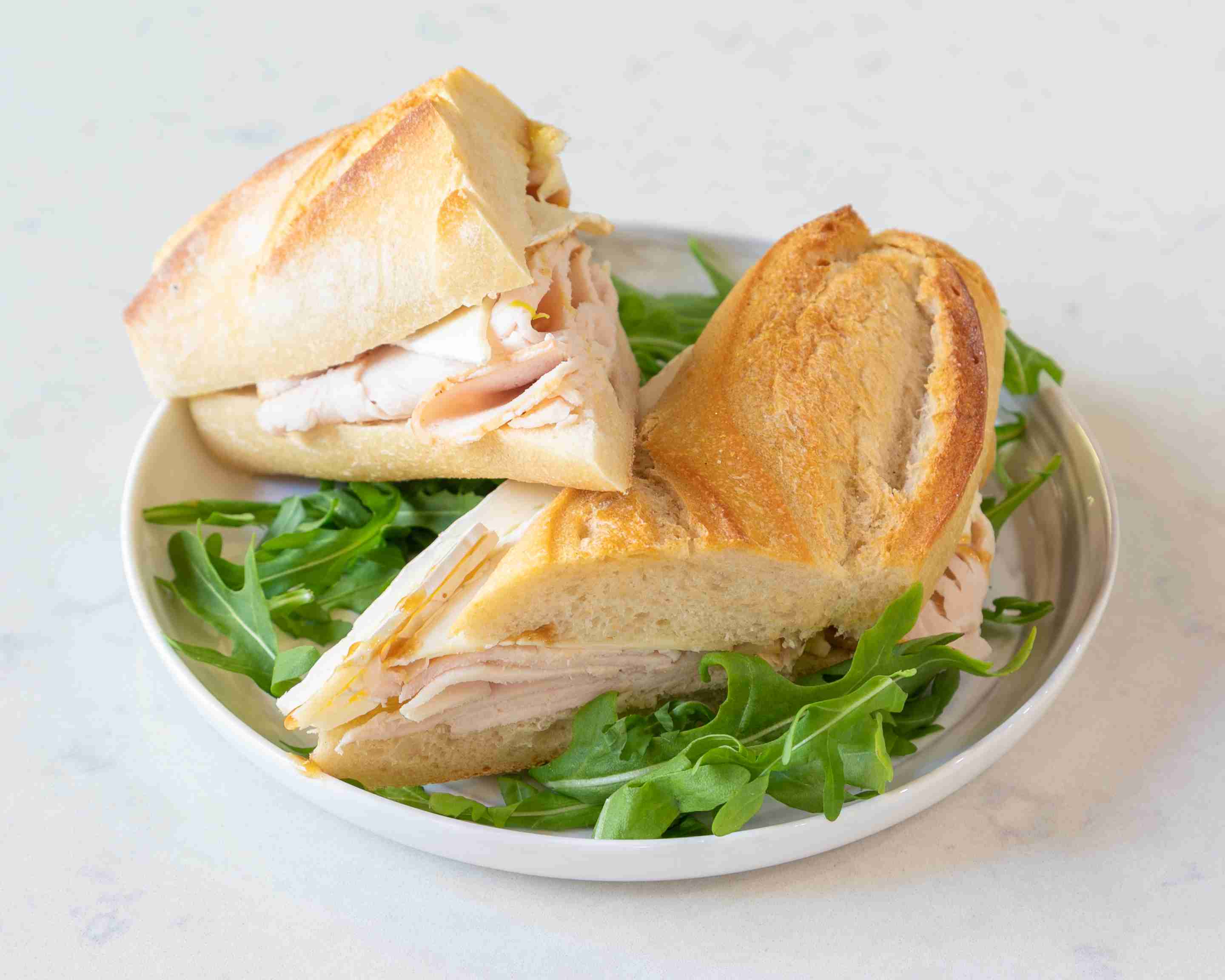 Order 1. Smoked Turkey with Brie Sandwich food online from Guy and Gallard - Madison Ave store, New York on bringmethat.com