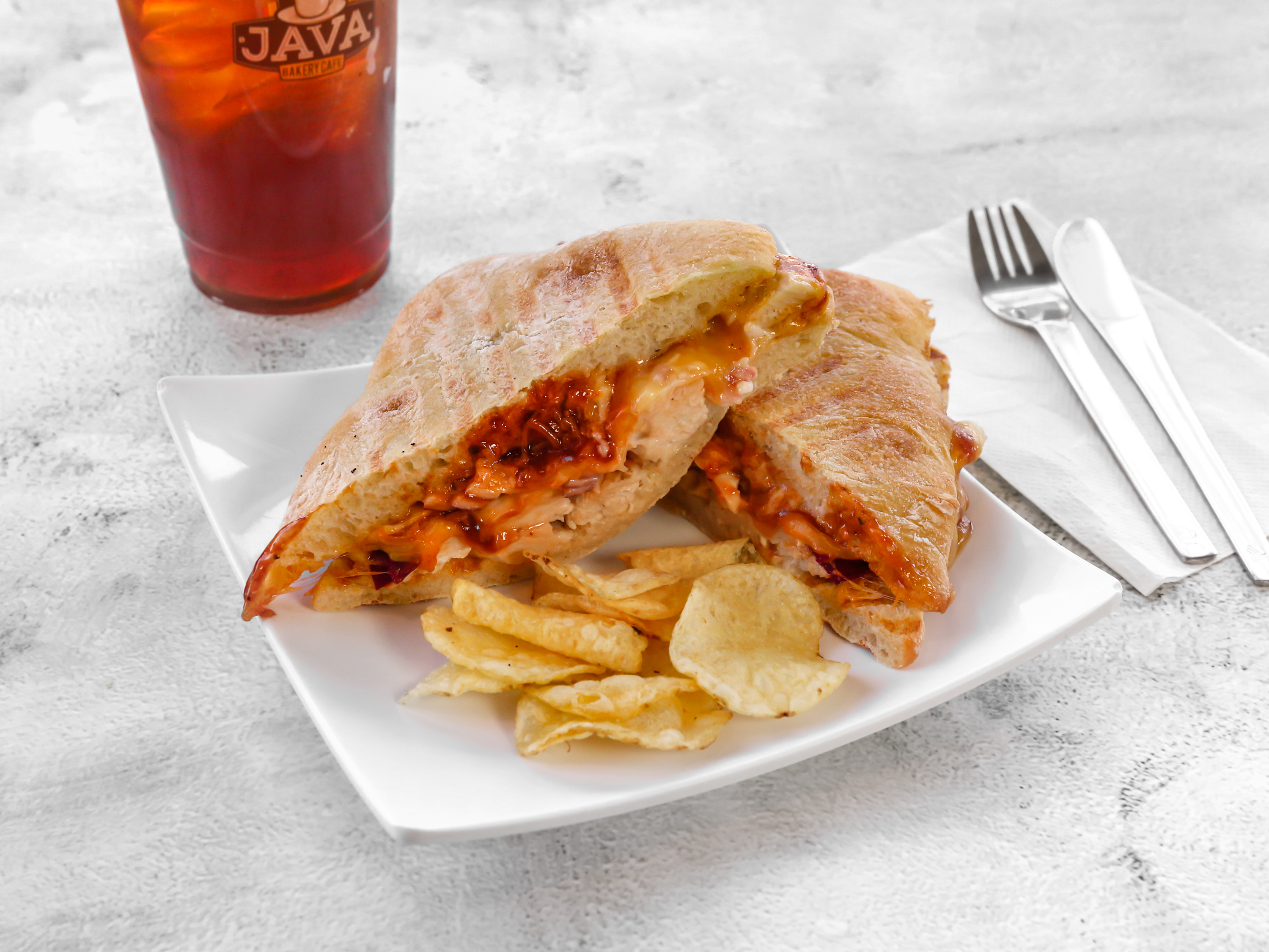 Order BBQ Chicken Panini food online from Java Bakery Cafe Lake Forest store, Lake Forest on bringmethat.com