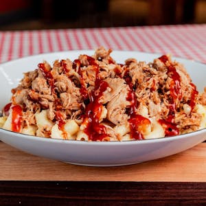 Order Mama Louise’s Mac & Cheese with BBQ (Regular) food online from Yummy Bones Barbecue store, Port Washington on bringmethat.com