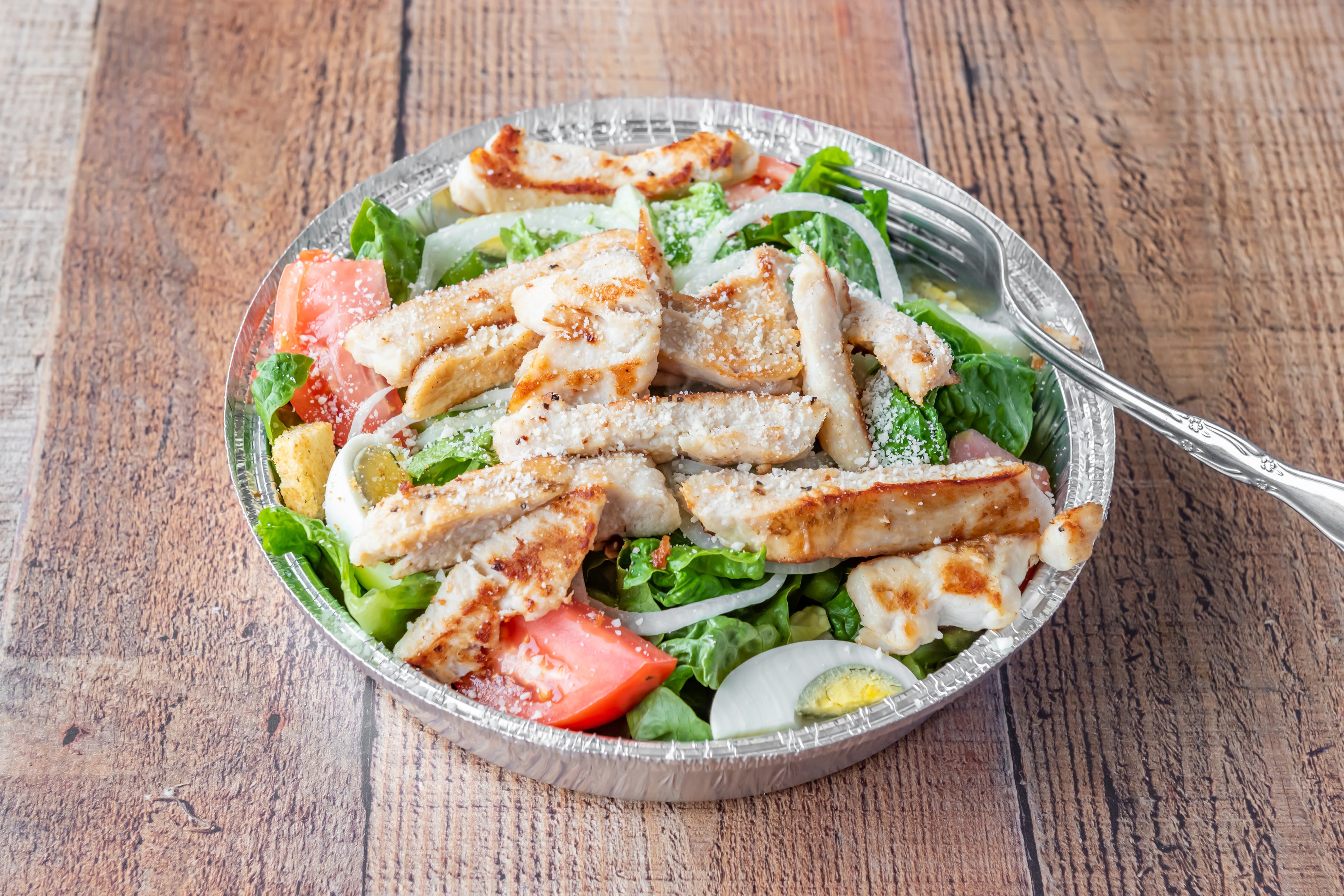 Order Chicken Caesar Salad - Salad food online from Pizza Villa store, Swedesboro on bringmethat.com
