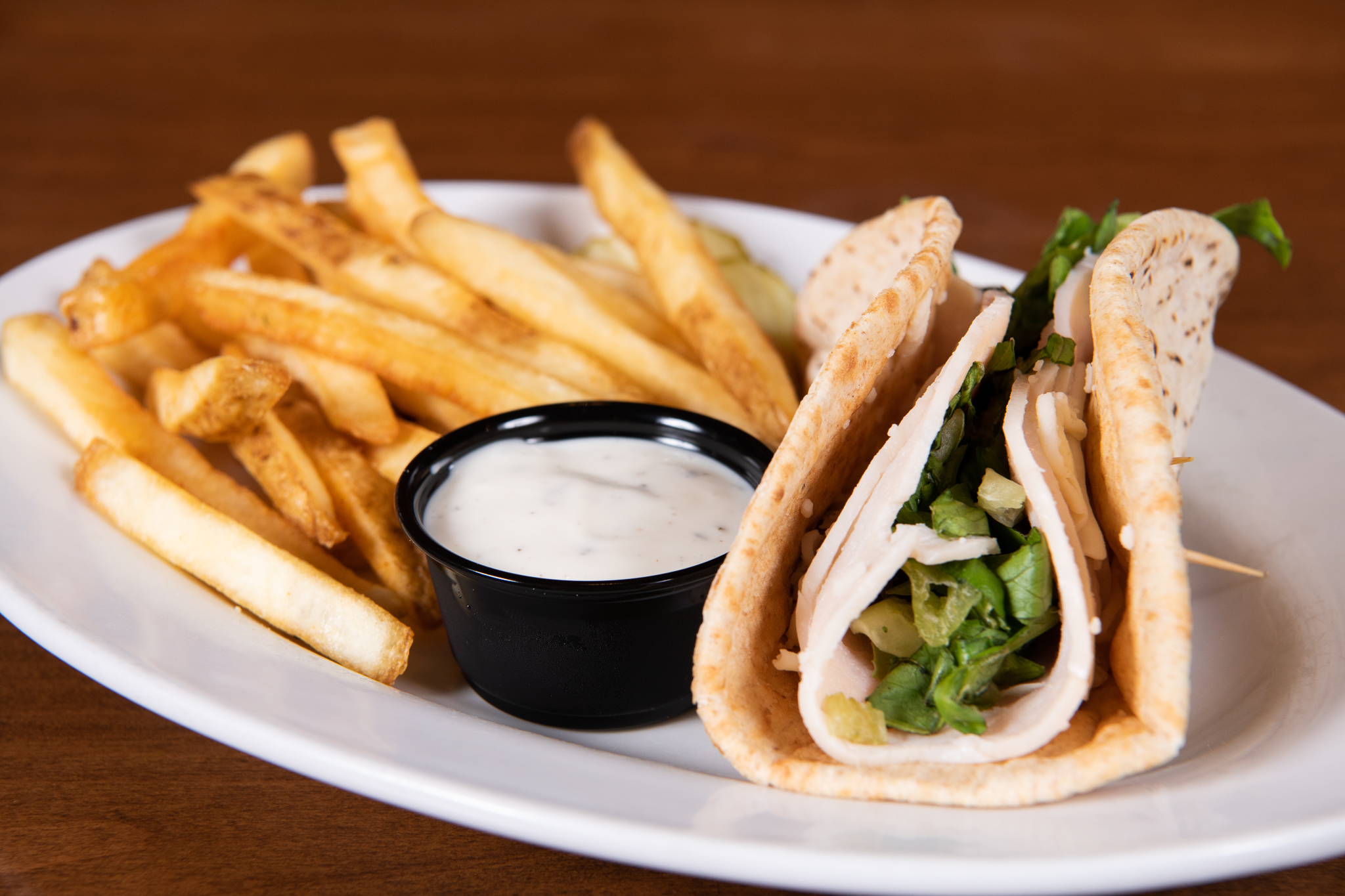 Order Kids Turkey Cheese & Lettuce Pita food online from Green Mill Restaurant & Bar store, Lakeville on bringmethat.com