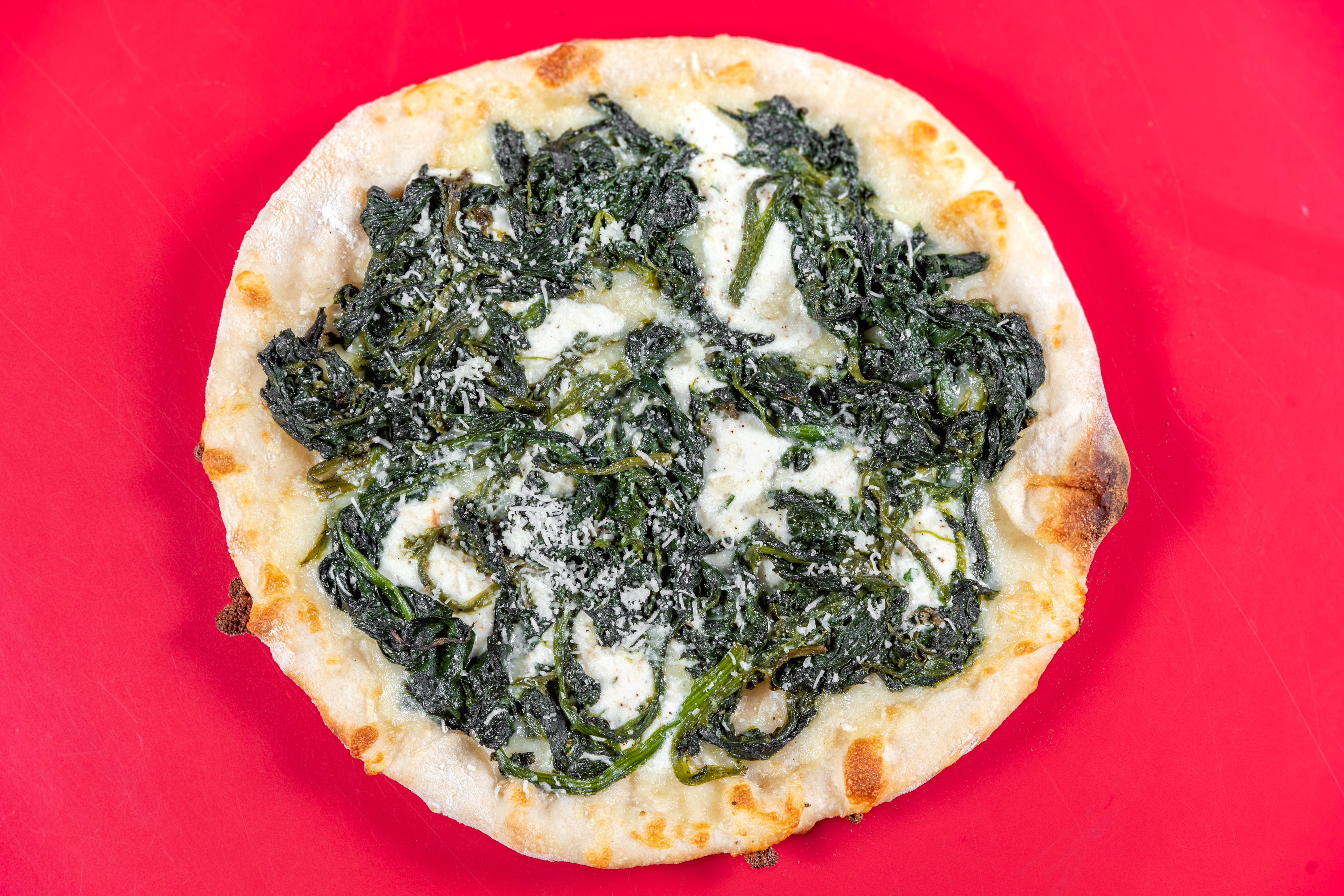 Order White Pizza with Spinach - Personal 10'' food online from The grotto pizzeria & ristorante store, New York on bringmethat.com