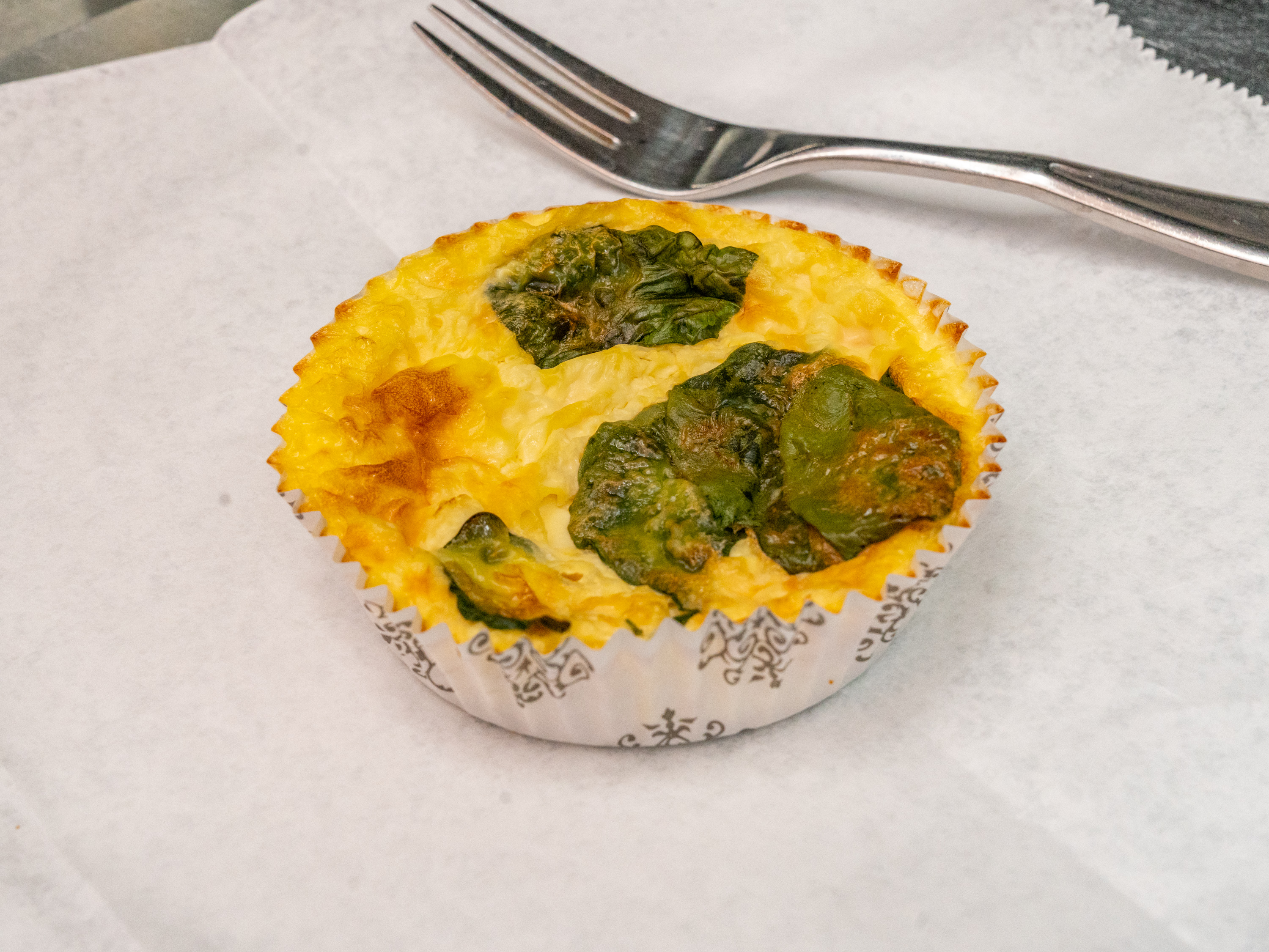 Order Mini Quiche spinach and cheddar food online from Chez Michael French Market store, Avon on bringmethat.com