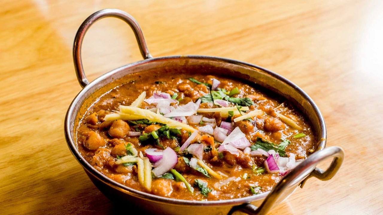 Order Chole Punjabi food online from Dhaba indian cuisine store, New York on bringmethat.com