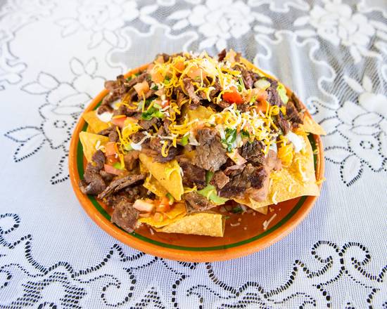 Order Steak Nachos food online from Rivas Mexican Grill store, Carson City on bringmethat.com