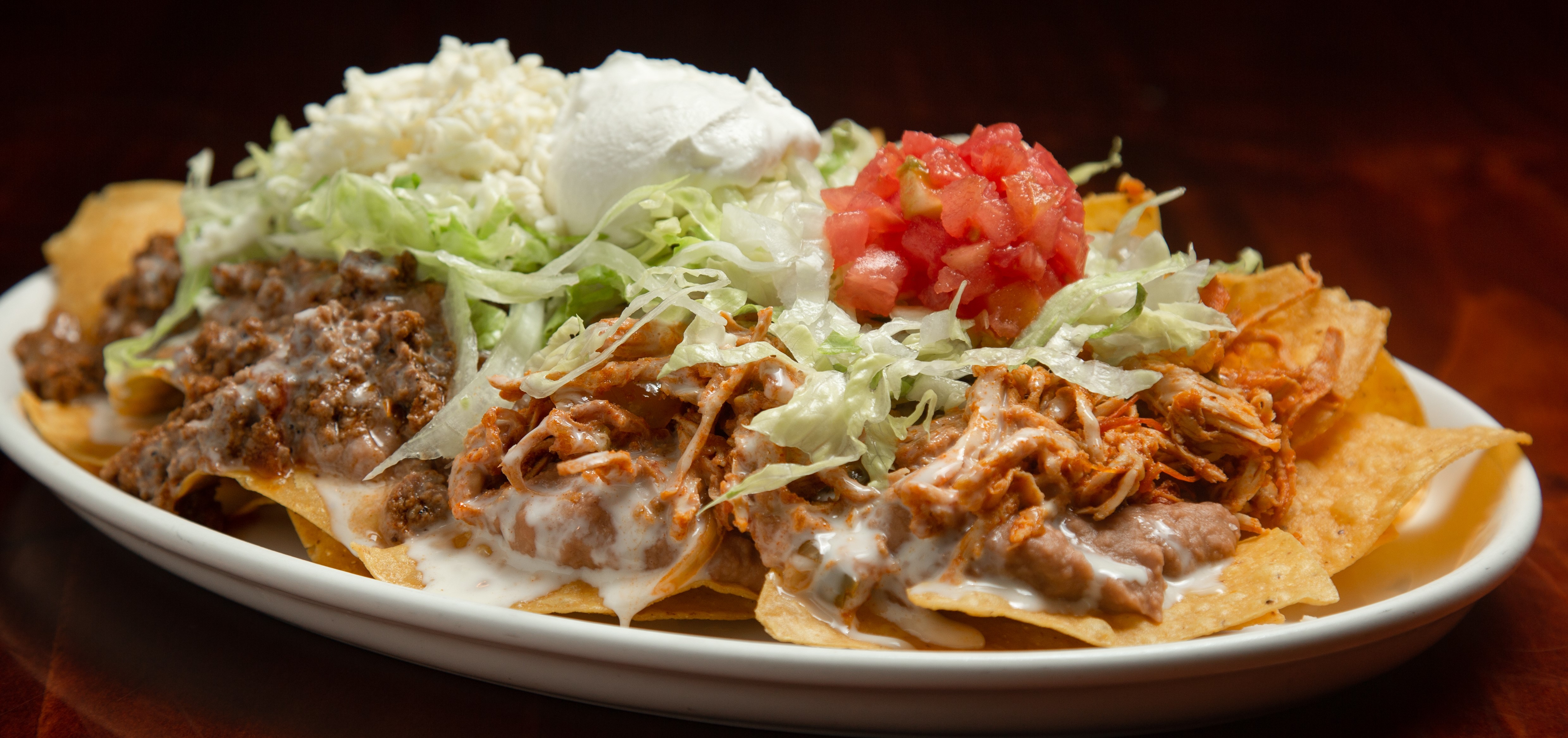 Order Nachos Supremos food online from Tito Mexican Restaurant store, Spring Hill on bringmethat.com
