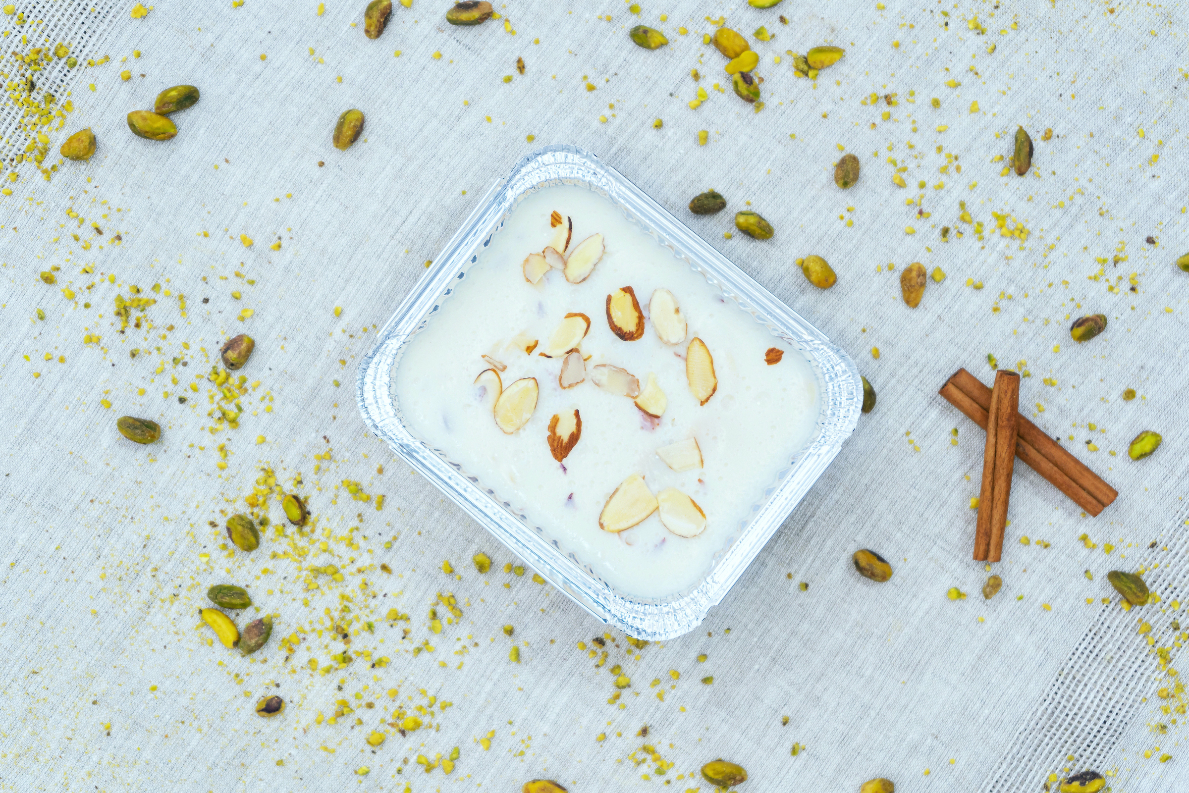 Order Almond Pudding (Keşkül) food online from Istanbul Grill California store, Fountain Valley on bringmethat.com