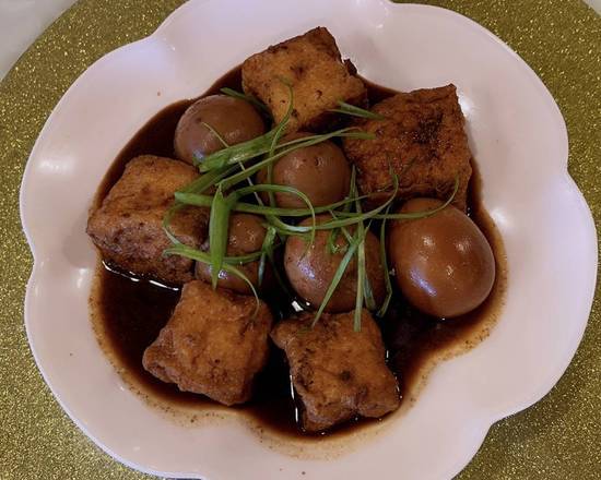 Order C14. Braised Eggs with Meat and Bean Curd 油豆腐塞肉紅燒蛋 food online from Shanghai Family Restaurant store, Cupertino on bringmethat.com