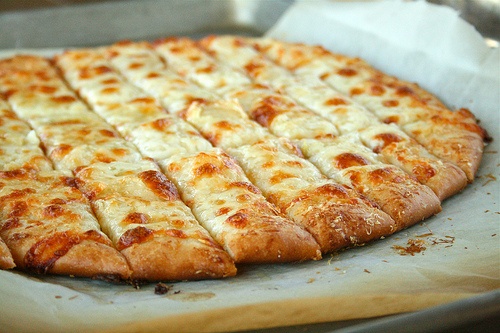 Order Cheesy Garlic Breadsticks food online from New York Pizza store, Hayward on bringmethat.com