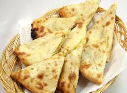 Order 70. Aloo Naan food online from Biryani Tika Kabab store, Oakland on bringmethat.com