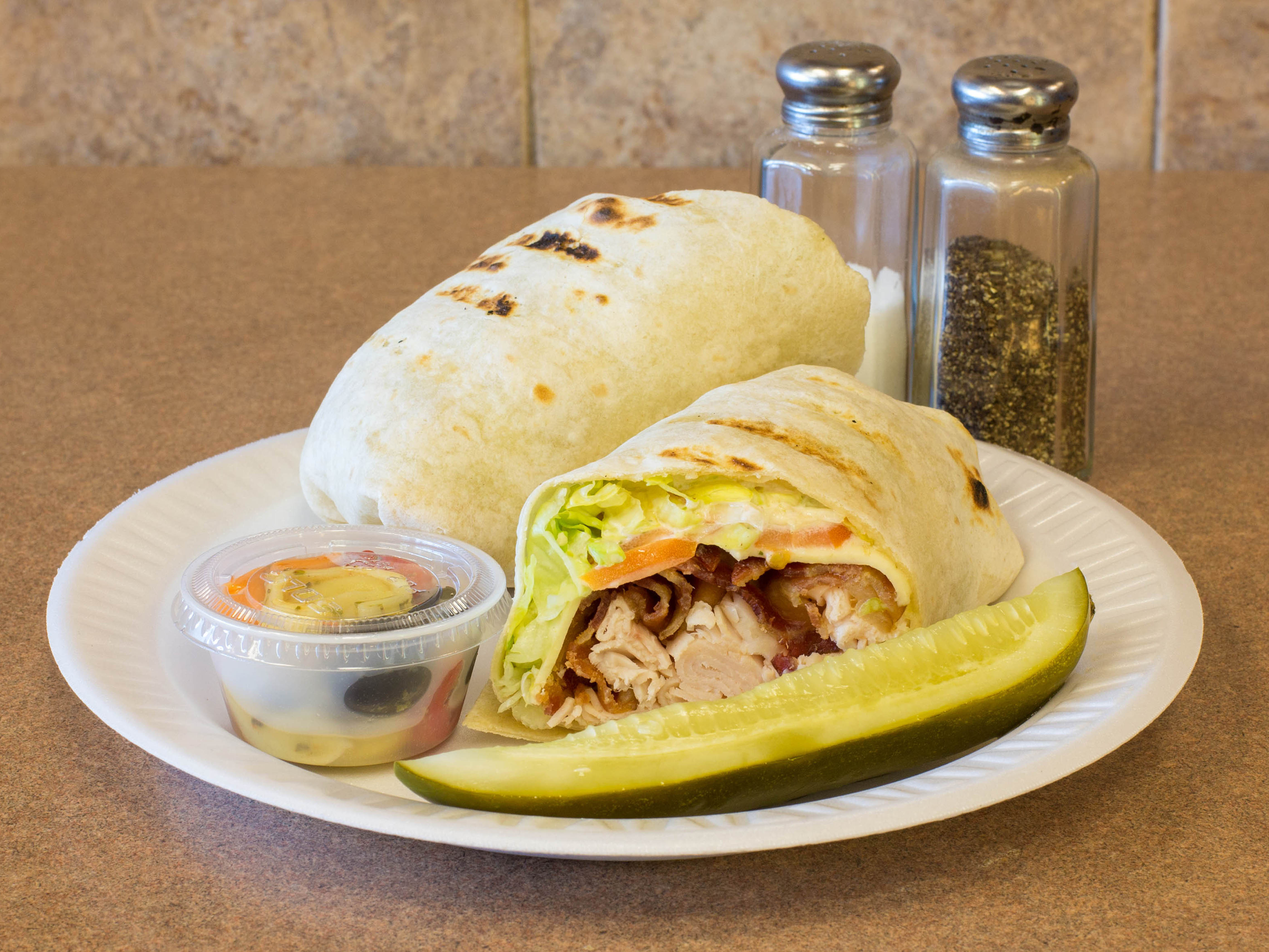 Order 3. Grilled Chicken Wrap with Fresh Mozzarella food online from Hot Bagels Abroad store, Clifton on bringmethat.com