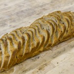 Order Olive Bread Sliced (2 lbs.) food online from Croissant Bakery store, Norcross on bringmethat.com