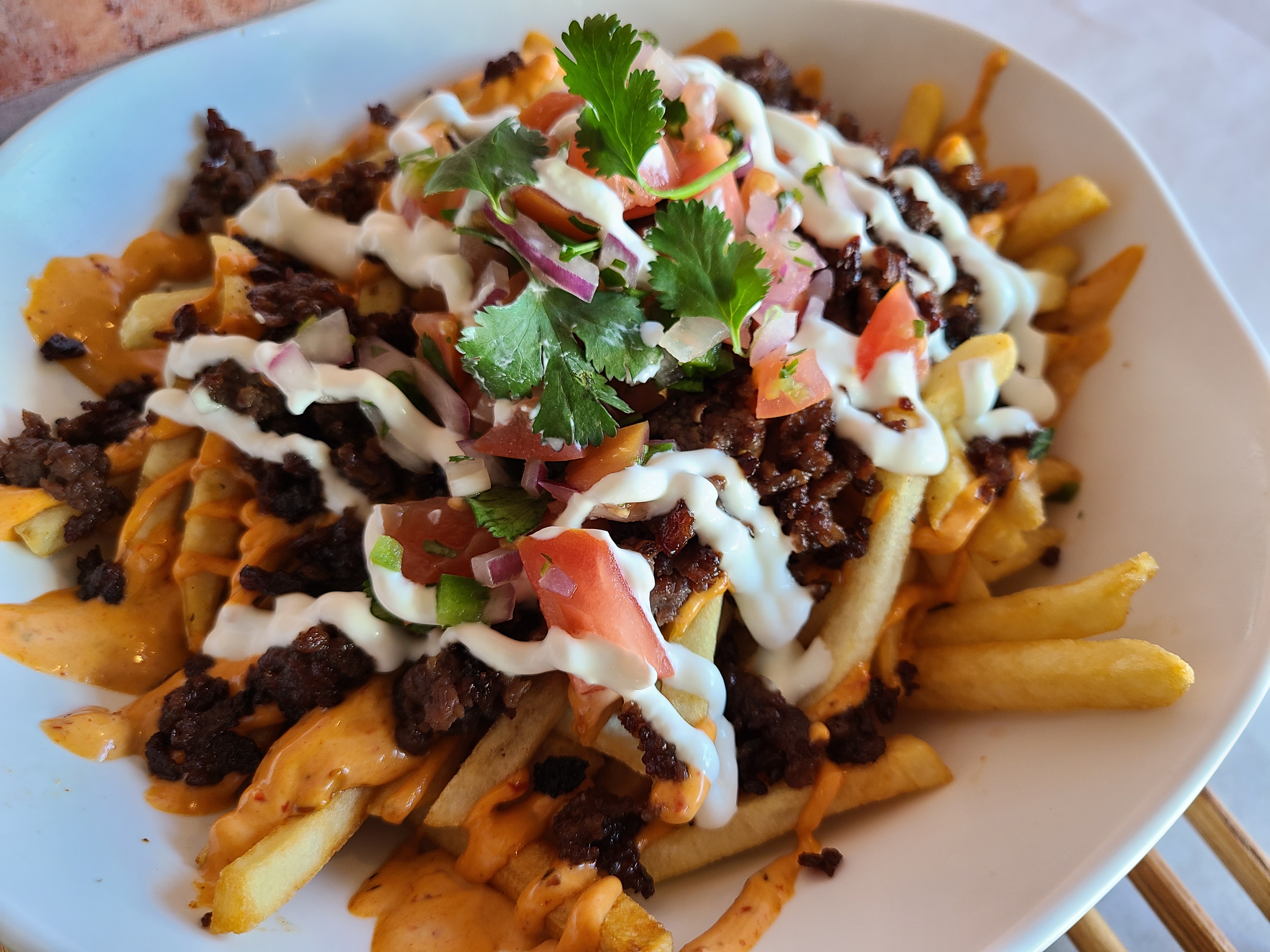 Order Loaded Beef Bulgogi Fries food online from The Cafe Krave store, Anaheim on bringmethat.com