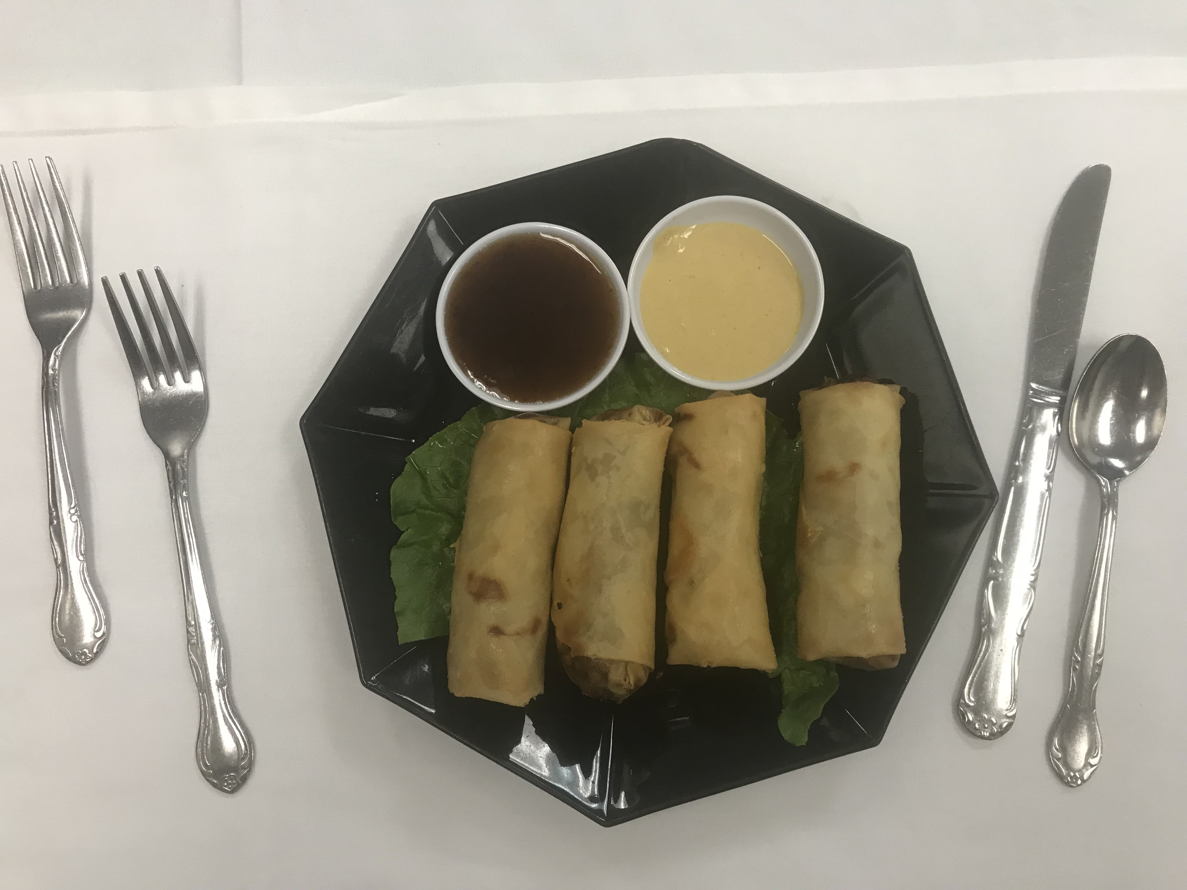 Order 4 Piece Spring Egg Rolls food online from Chateau Chang store, Victorville on bringmethat.com