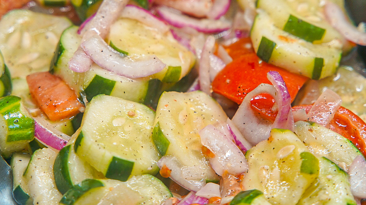 Order Tomato Cucumber Onion Salad	 food online from Harry's Hilltop Catering Delicatessen store, Williston Park on bringmethat.com