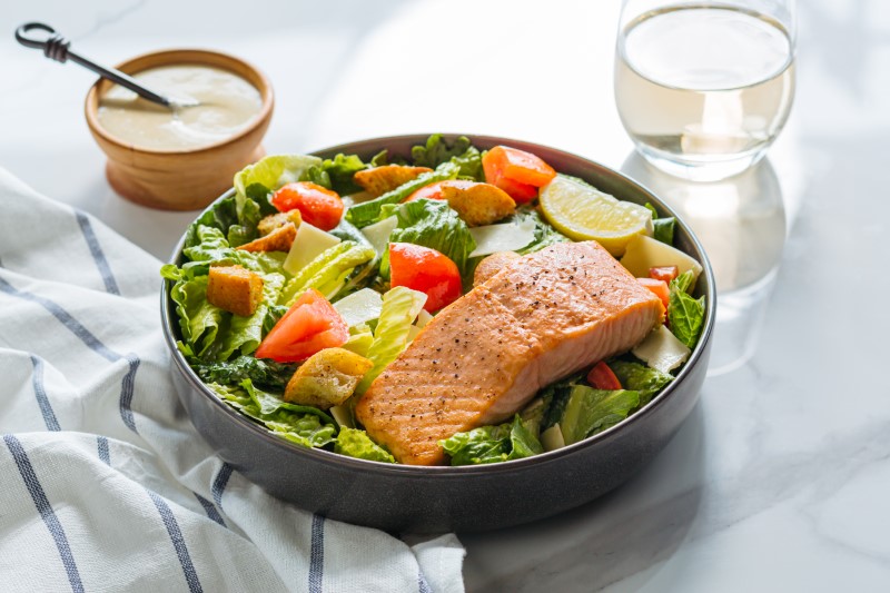 Order Grilled Salmon Caesar Salad food online from Urban Plates store, Torrance on bringmethat.com