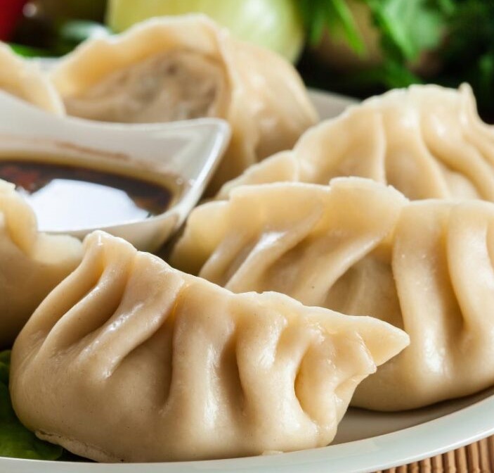 Order 22. Pork Dumplings food online from Profit Chinese Restaurant Ii store, New York on bringmethat.com