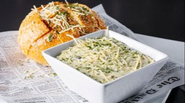 Order Stuffed Sourdough Cracked Bread w/Fresh Spinach Cheese Dip food online from Distill store, Henderson on bringmethat.com