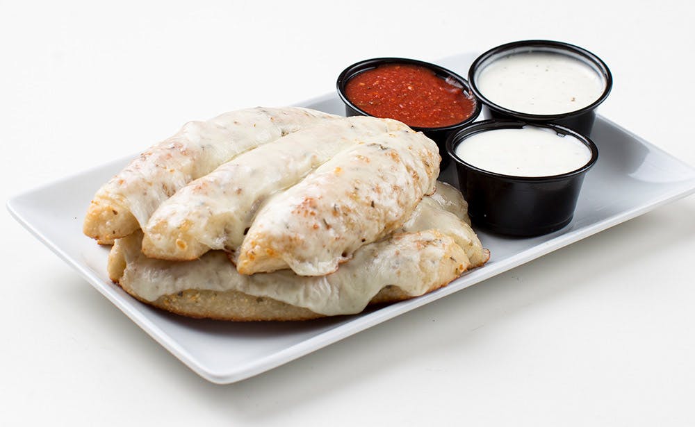 Order Breadsticks with Cheese - Side food online from Calz Pizza store, Norfolk on bringmethat.com