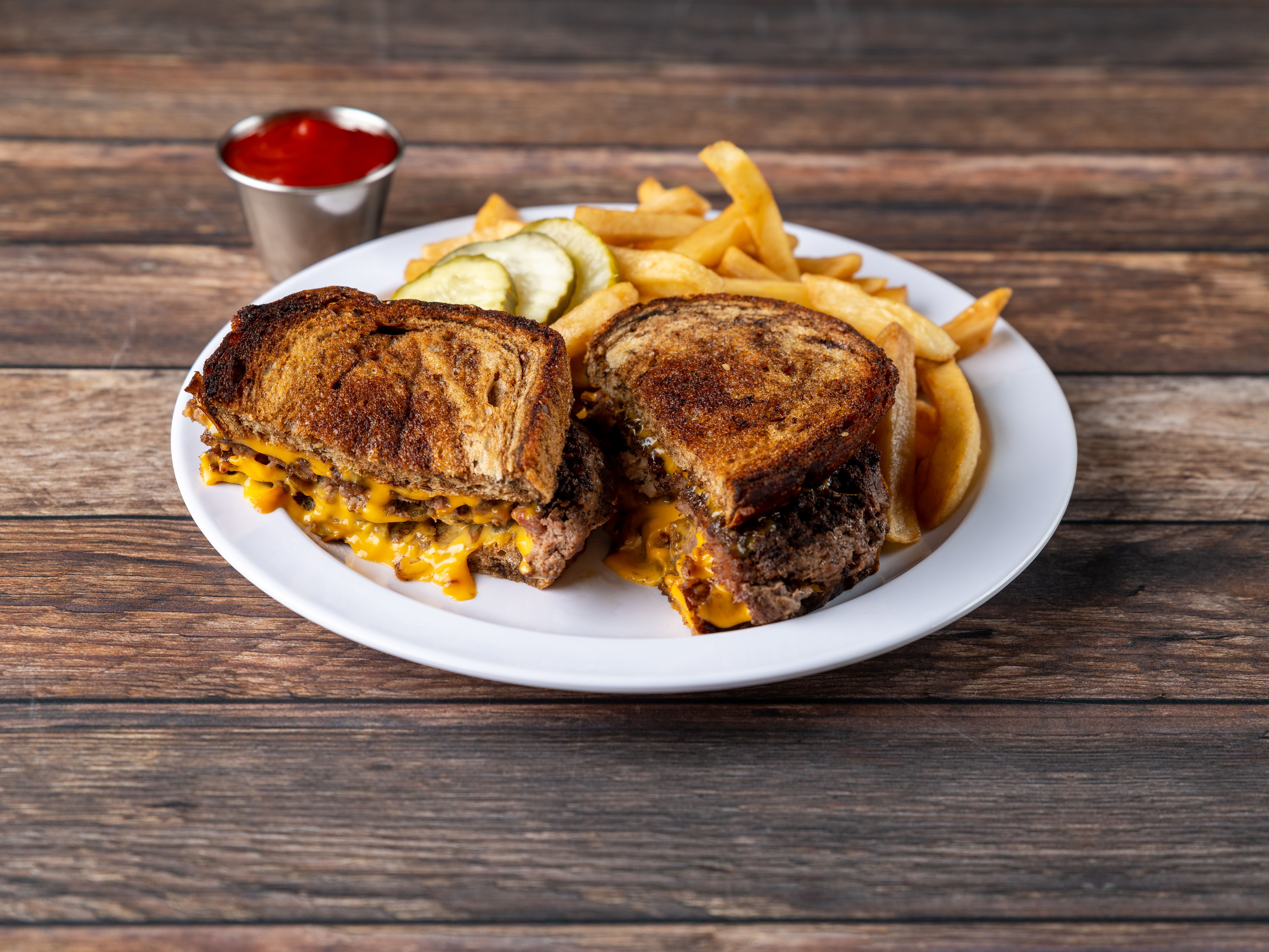 Order 1/2 lb. Ground Beef Patty Melt food online from Breakfast King store, Denver on bringmethat.com
