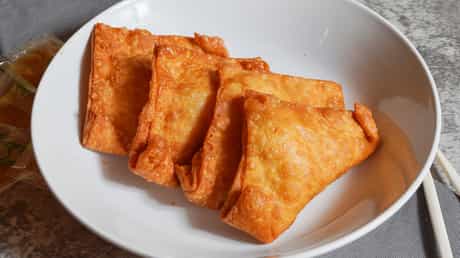 Order 11. Crab Rangoon food online from New China store, Kenneth City on bringmethat.com