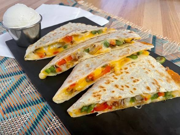 Order Veggie Quesadilla food online from Taco Bout It store, North Plainfield on bringmethat.com