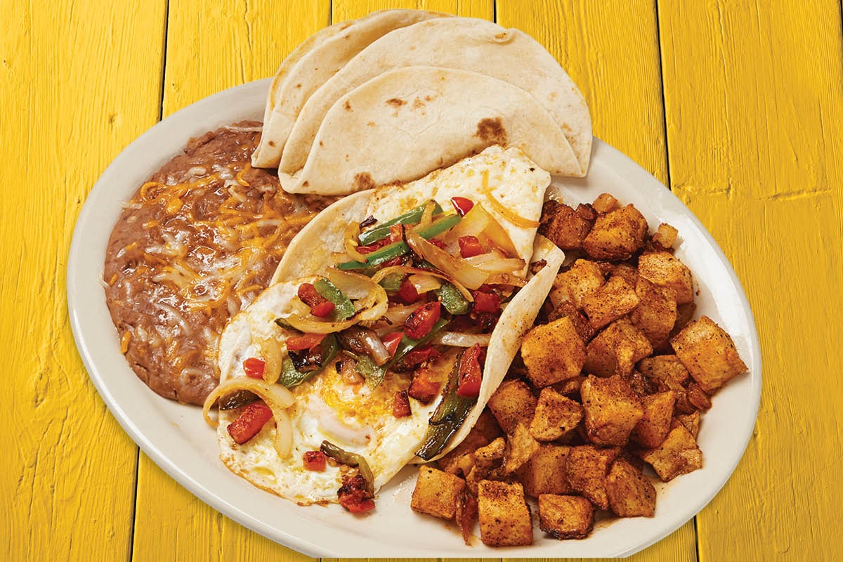 Order Huevos Rancheros food online from Fuzzy's Taco Shop store, DeSoto on bringmethat.com