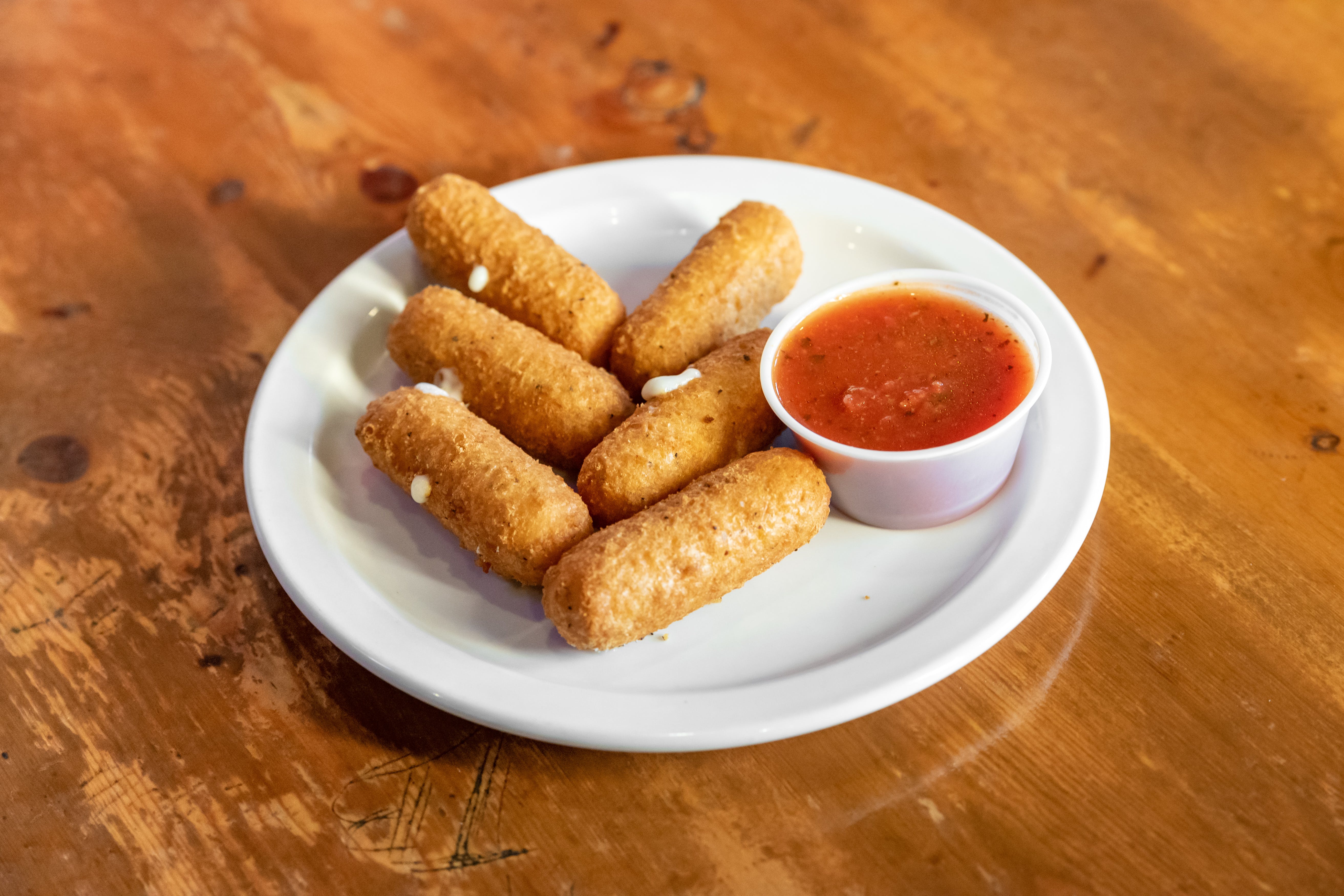 Order Mozzarella Sticks - Appetizer food online from George's Pizza store, High Point on bringmethat.com