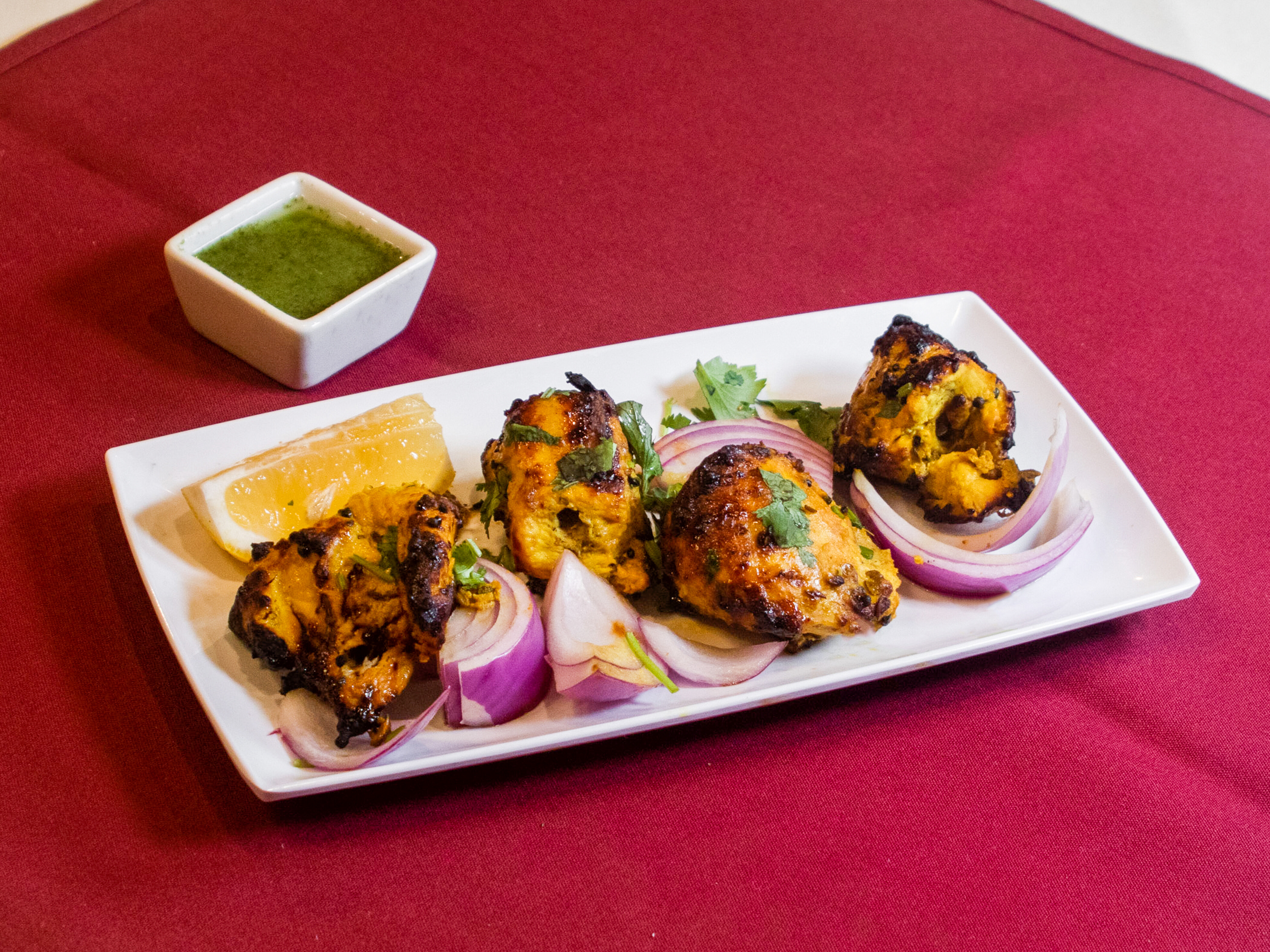 Order Achari Chicken Tikka food online from Raaga Tandoor store, Burke on bringmethat.com