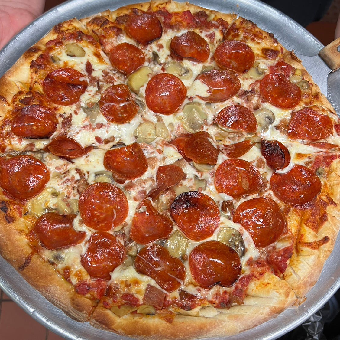 Order 19. Pepperoni, Mushrooms & Bacon Pizza - 12'' food online from Italia Pizza store, El Cajon on bringmethat.com
