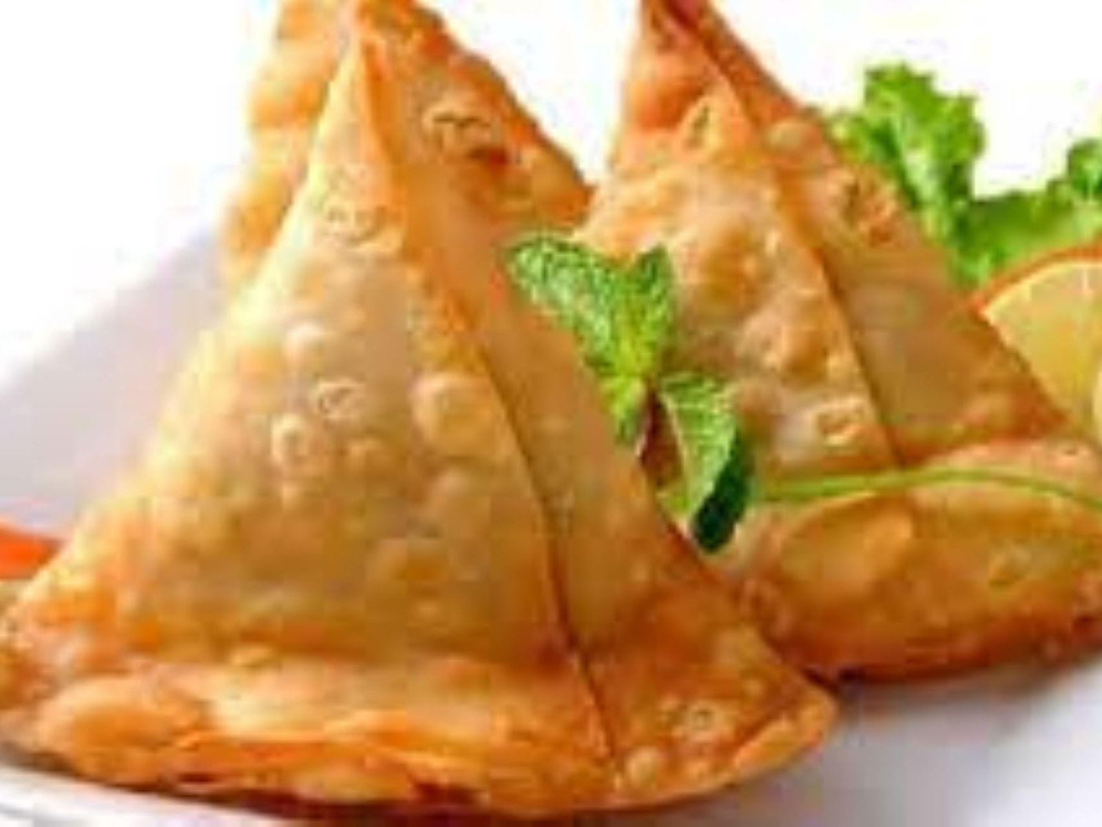 Order Vegetable Samosa food online from Passage to India store, Cambridge on bringmethat.com