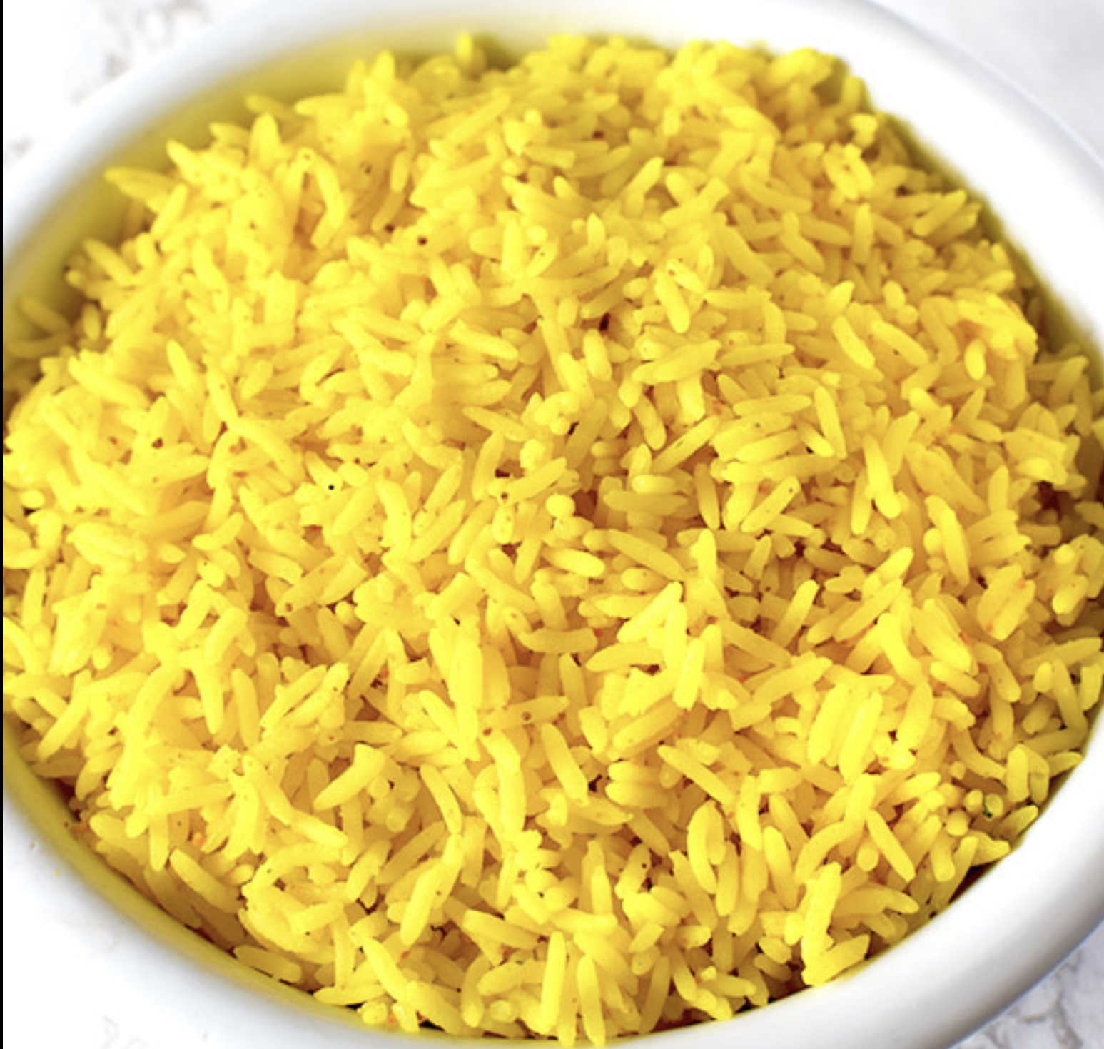 Order Yellow Rice food online from Paradise Jamaican Cuisine store, Morrisville on bringmethat.com