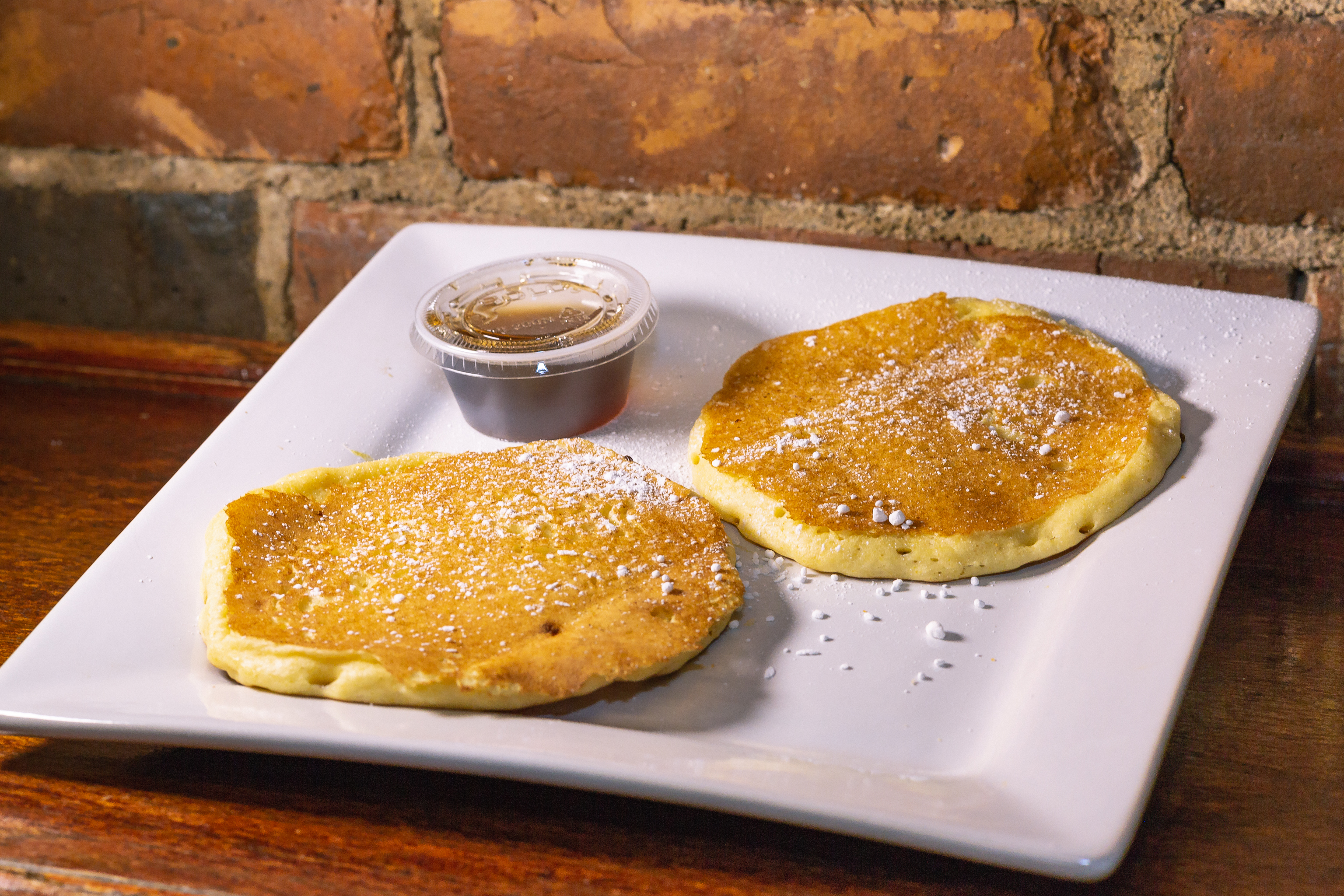 Order Two Buttermilk Pancakes food online from Oasis Cafe & Bakery store, Medford on bringmethat.com