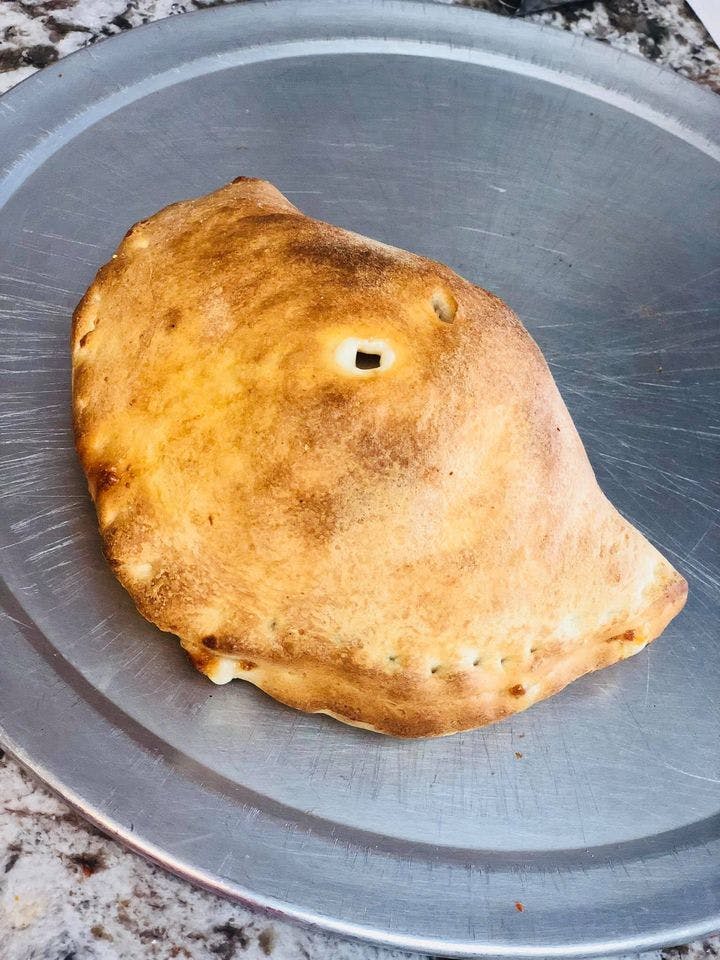 Order Baked Calzone - Calzone food online from J & S Pizza store, South Amboy on bringmethat.com