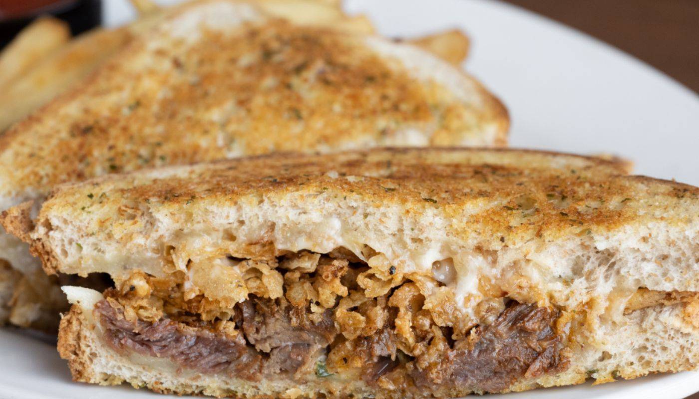 Order Slow-Roasted Beef Melt food online from Green Mill Restaurant &Amp; Bar store, Saint Paul on bringmethat.com