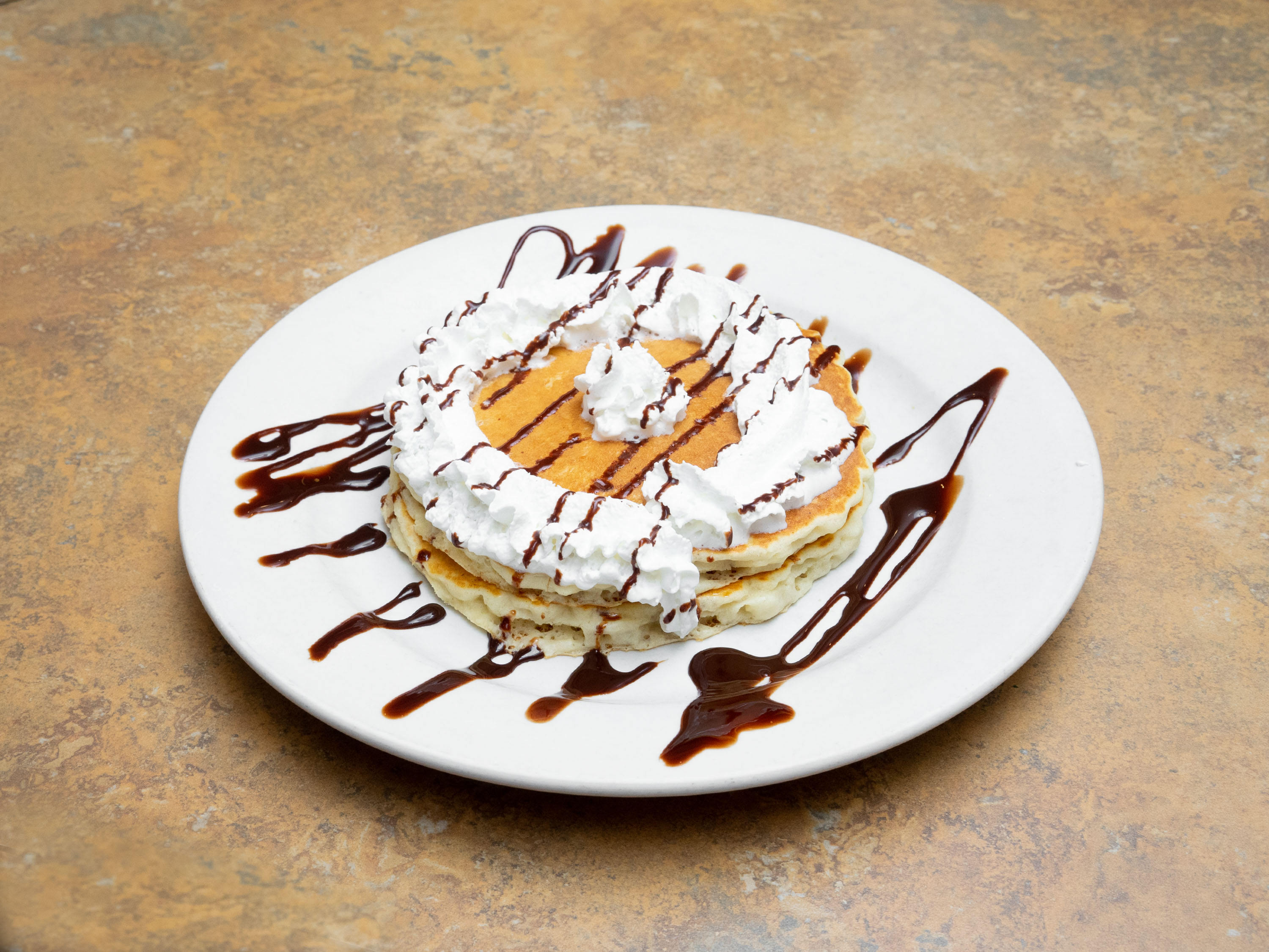 Order Specialty Fresh Fruit Pancakes food online from Les Cafe Pancake House store, Highland on bringmethat.com