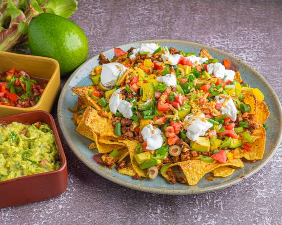 Order Loaded Nachos food online from Finish Line Burgers store, Dallas on bringmethat.com