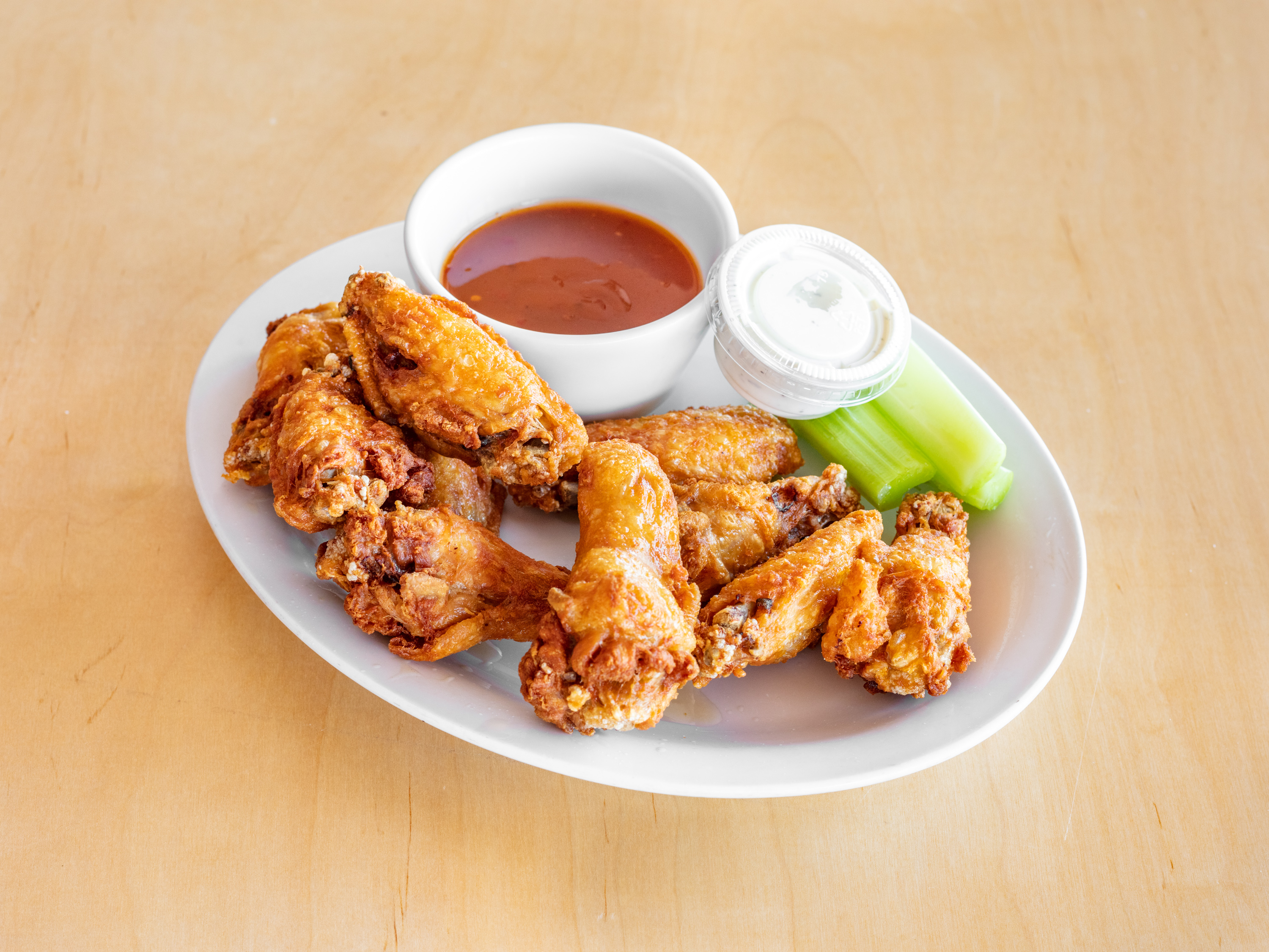 Order Traditional Buffalo Chicken Wings food online from Lutes' Casino store, Yuma on bringmethat.com