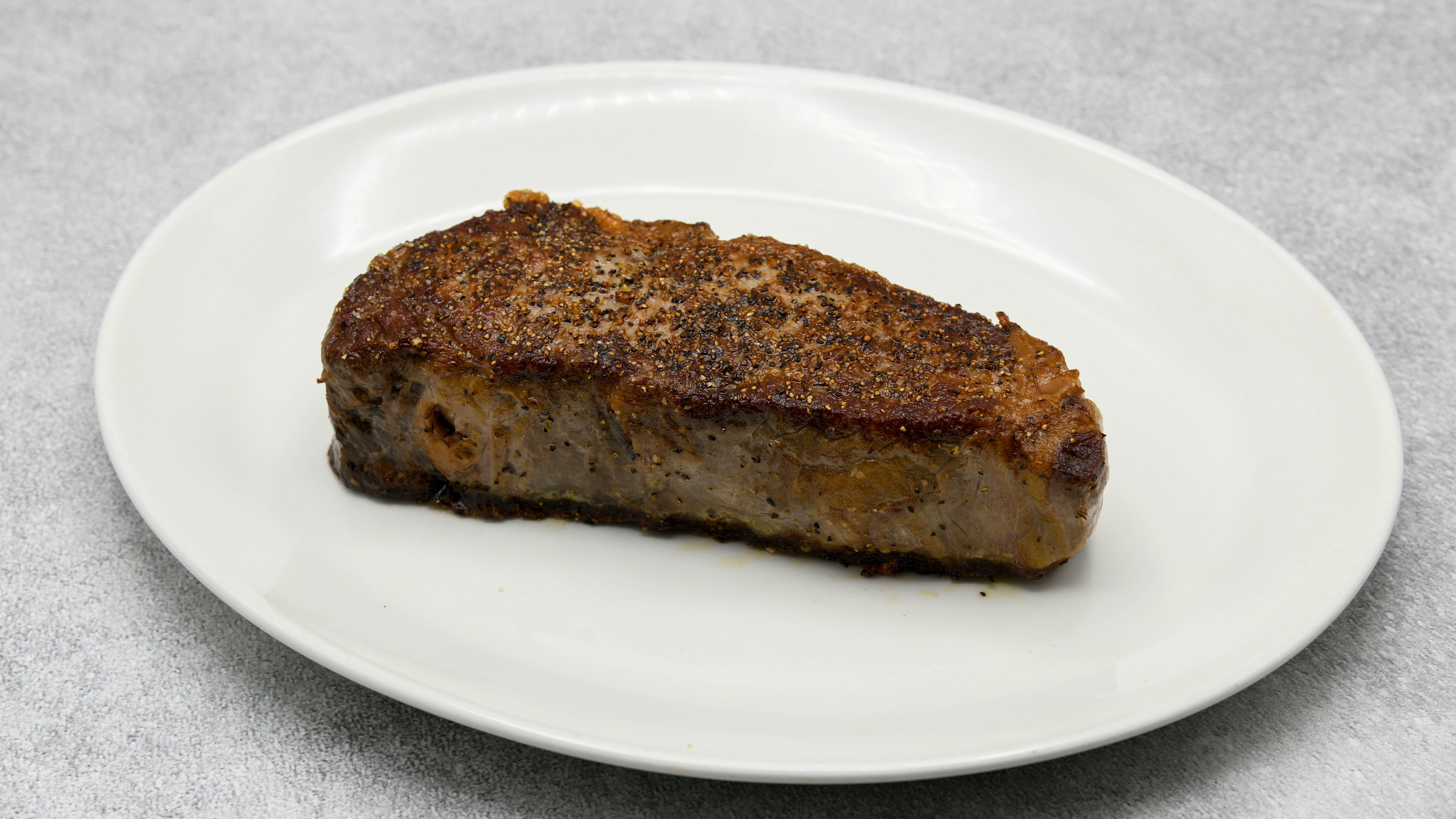 Order 45 Days Dry-Aged Prime NY Strip 16 oz food online from Del Frisco's store, Houston on bringmethat.com