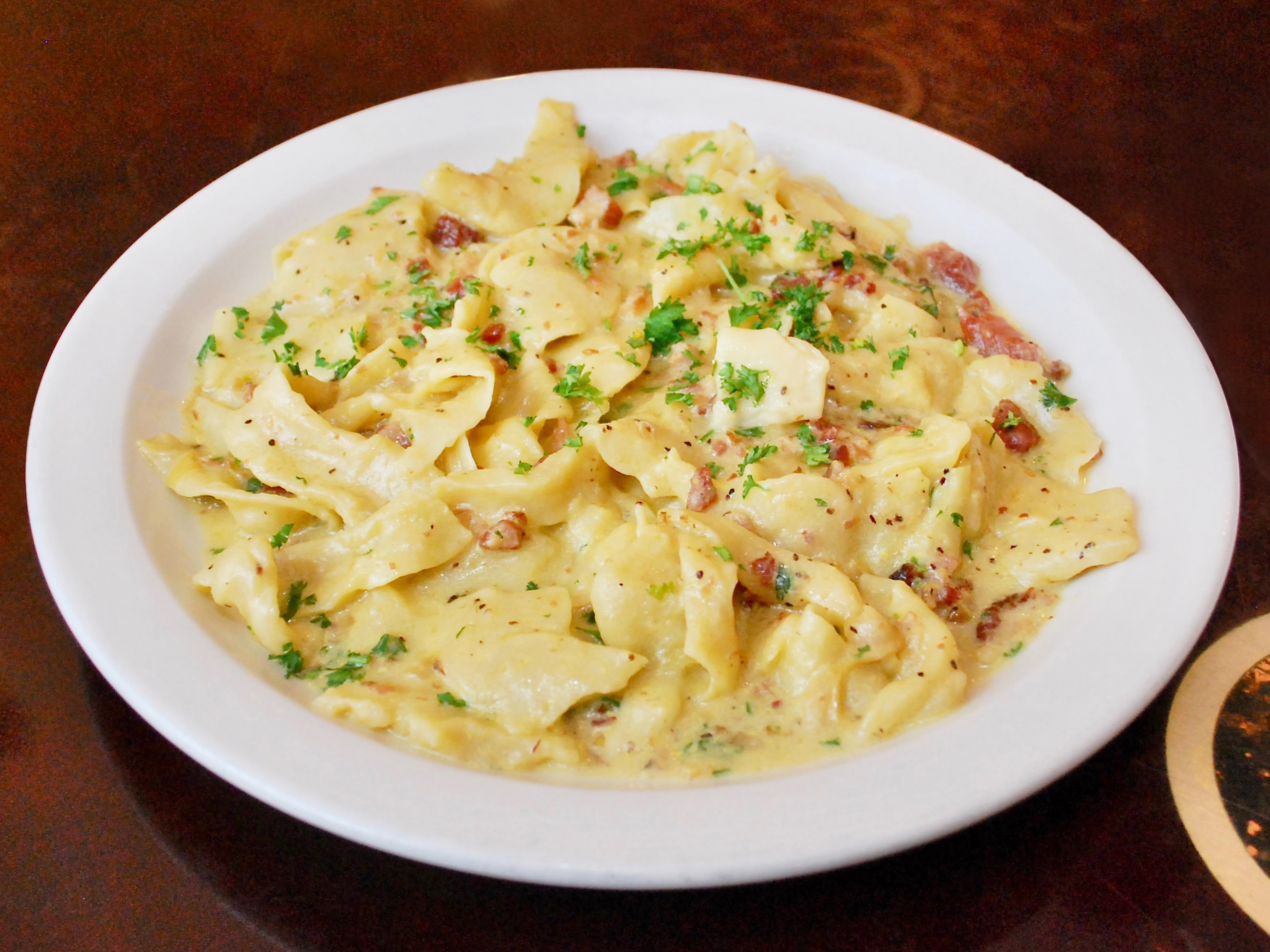 Order Tagliatelle Carbonara food online from Tanos pizza store, Chicago on bringmethat.com