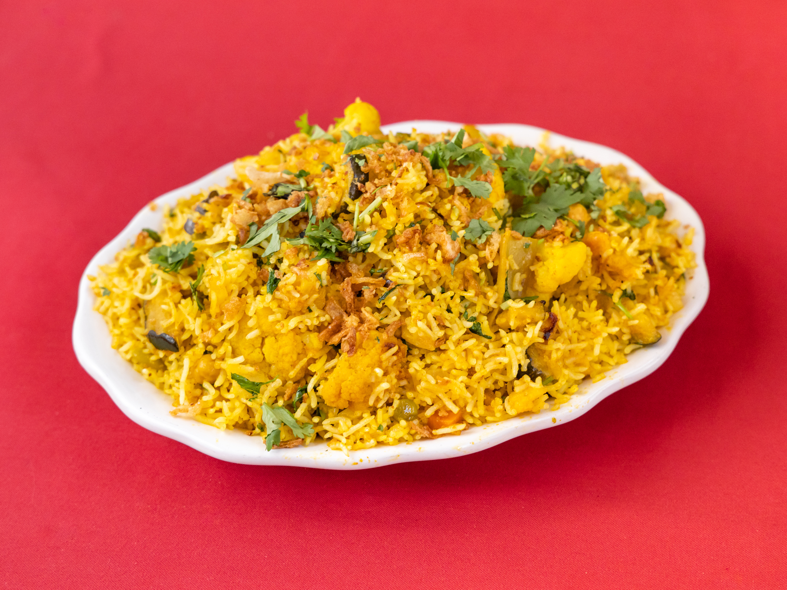 Order Vegetable Biryani food online from Lal Mirch Indian Restaurant store, Agoura Hills on bringmethat.com