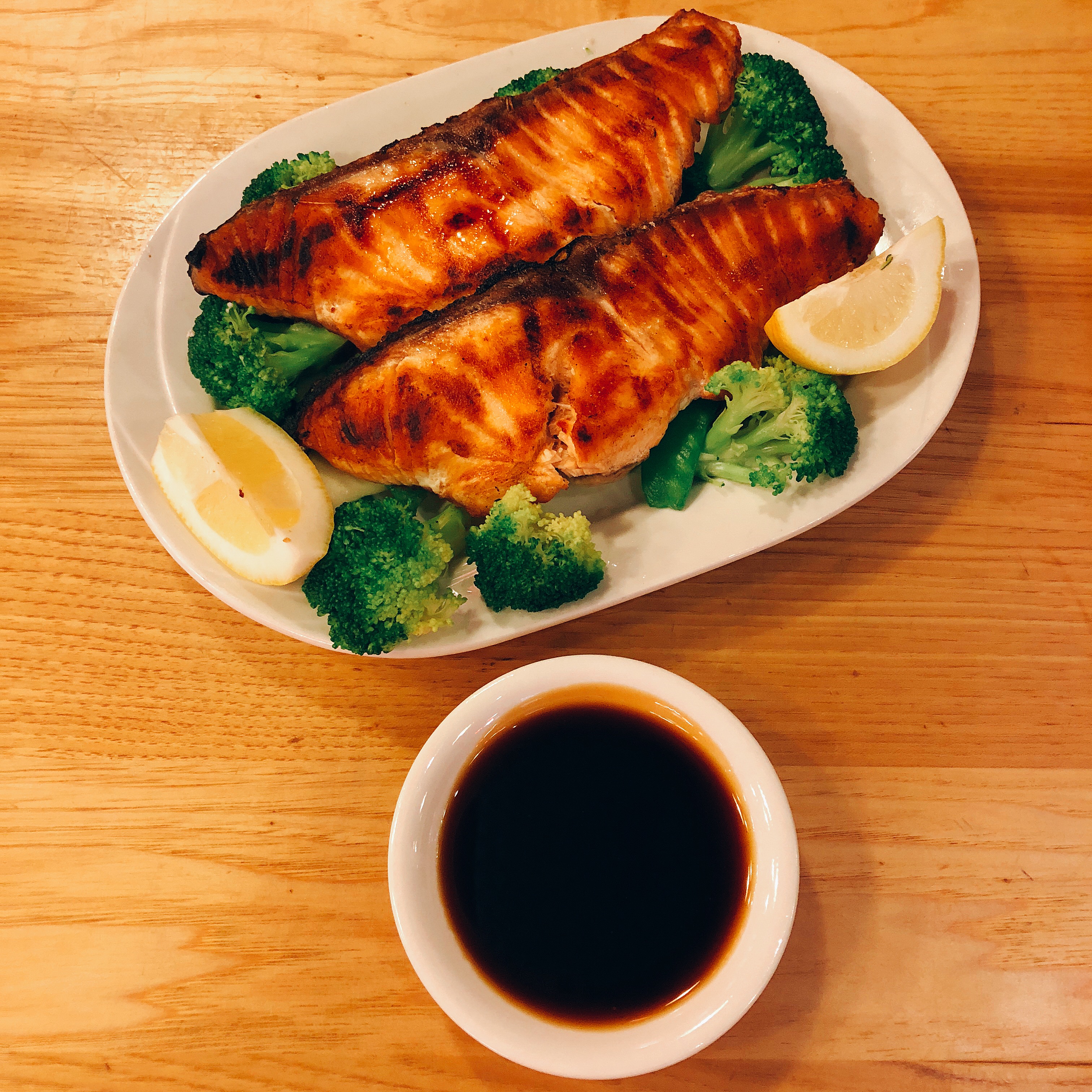 Order CS12. Grilled Salmon food online from Ollie's Noodle Shop & Grille store, New York on bringmethat.com