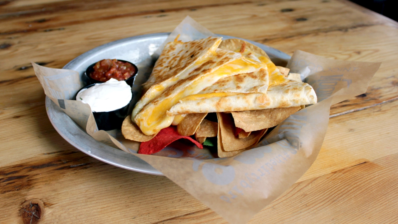 Order Ultimate Cheese Quesadilla food online from Junior's Bar and Grill store, Albany on bringmethat.com
