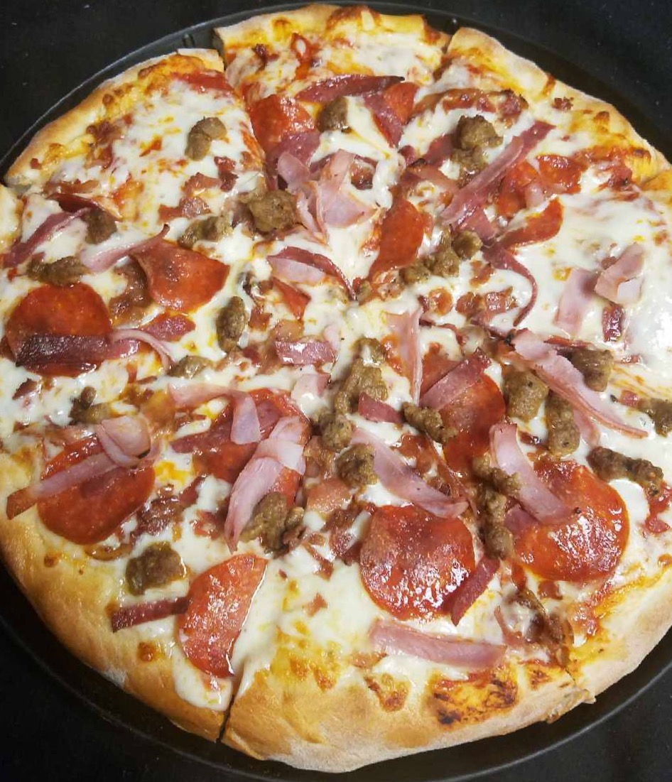 Order Ultimate Meat Pizza food online from Shotz Bar & Grille store, Austintown on bringmethat.com