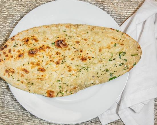 Order GARLIC NAAN food online from Indian harvest store, Naperville on bringmethat.com