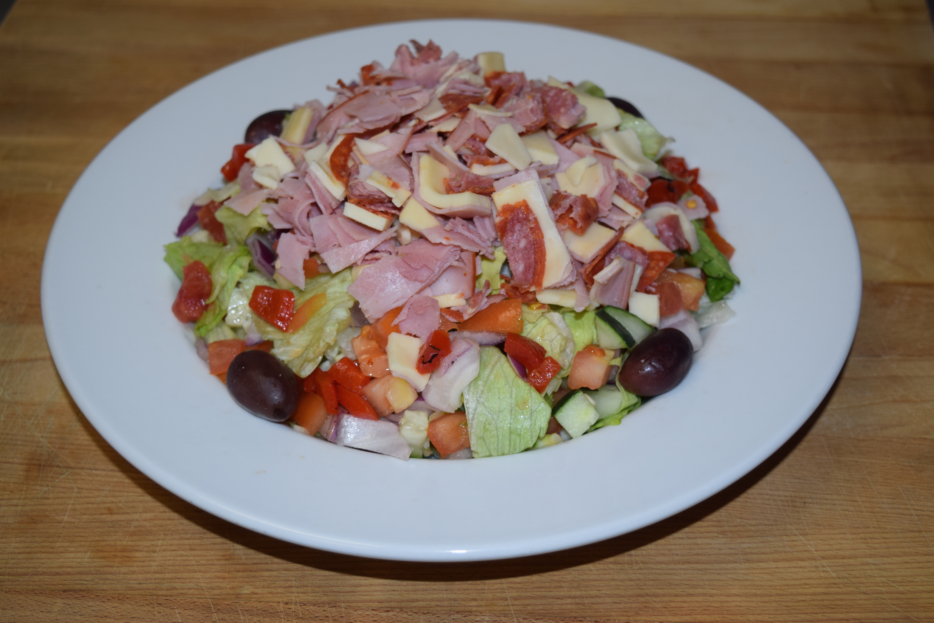 Order Chopped Antipasto Salad food online from Cuzino Pizza & Pasta store, Bear on bringmethat.com